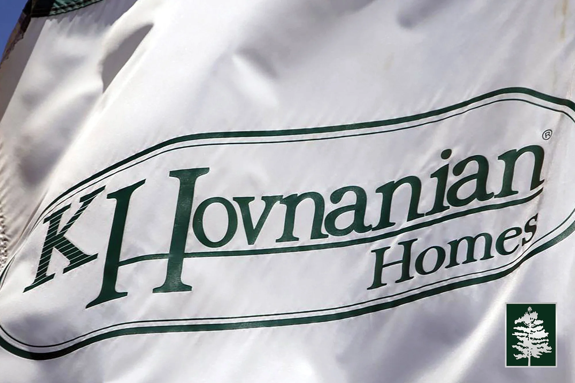 Close-up of a white bag with green text reading "K Hovanian Homes."