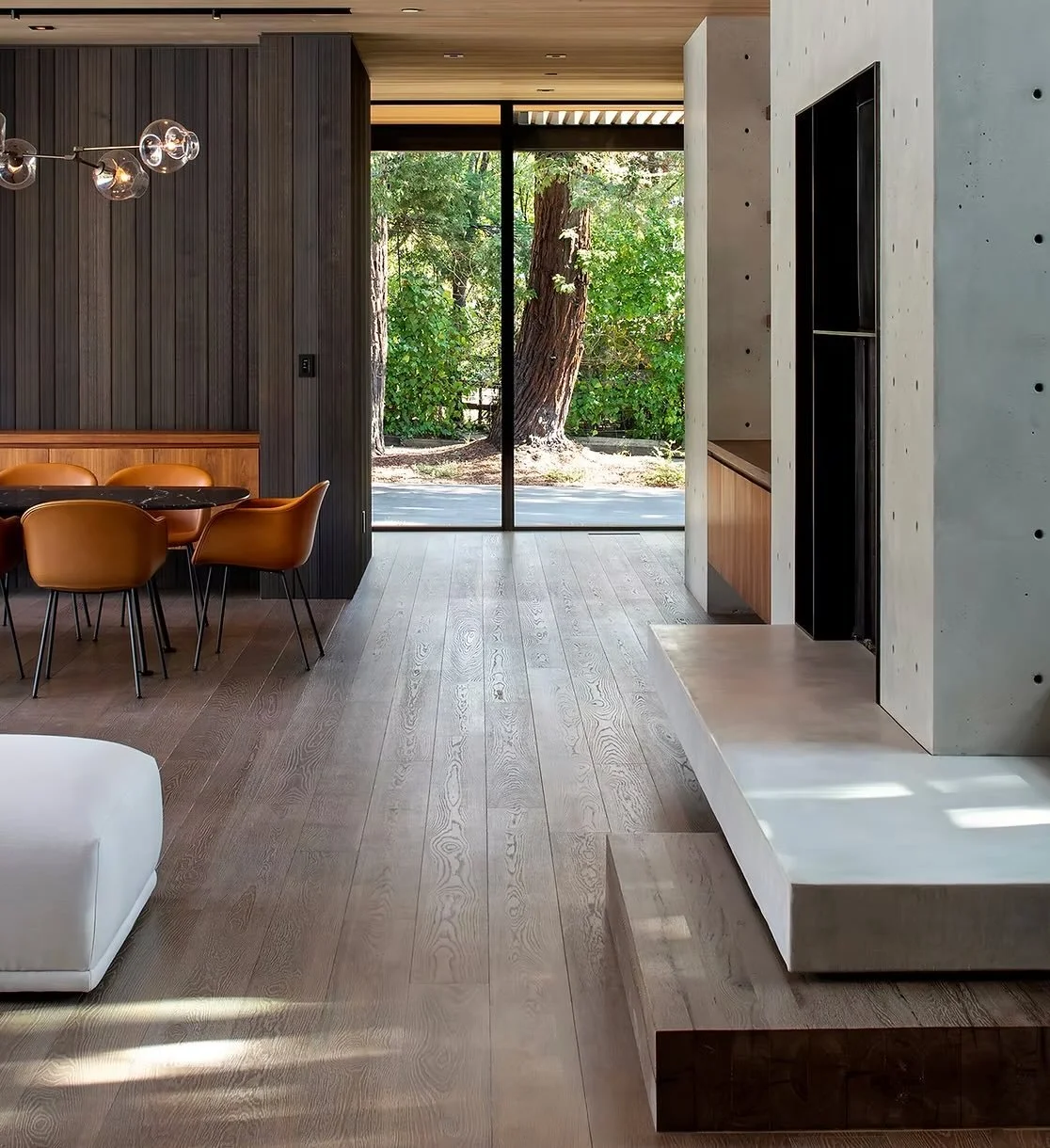 Wide-plank wood floors ground the home with warmth and restraint, moving seamlessly across levels, stairs, and thresholds. Each detail, clean transitions, thoughtful reveals, and consistent grain, was carefully executed to support the architecture ra