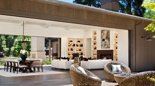 When the doors disappear and the flooring carries the design.
Warm wood tones flowing from kitchen to living to patio &mdash; anchoring every moment in between.
Great design connects spaces. Exceptional craftsmanship makes them last.

Builder @parago