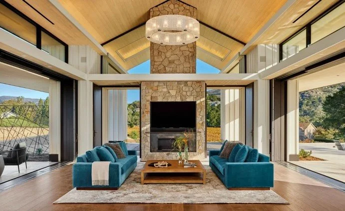 Where architecture meets landscape.
Seamless indoor-outdoor living, grounded by warm wood tones, natural stone, and soft layered textures.
This is what it looks like when every material speaks the same language.

Builder : @knittel_construction
Inter