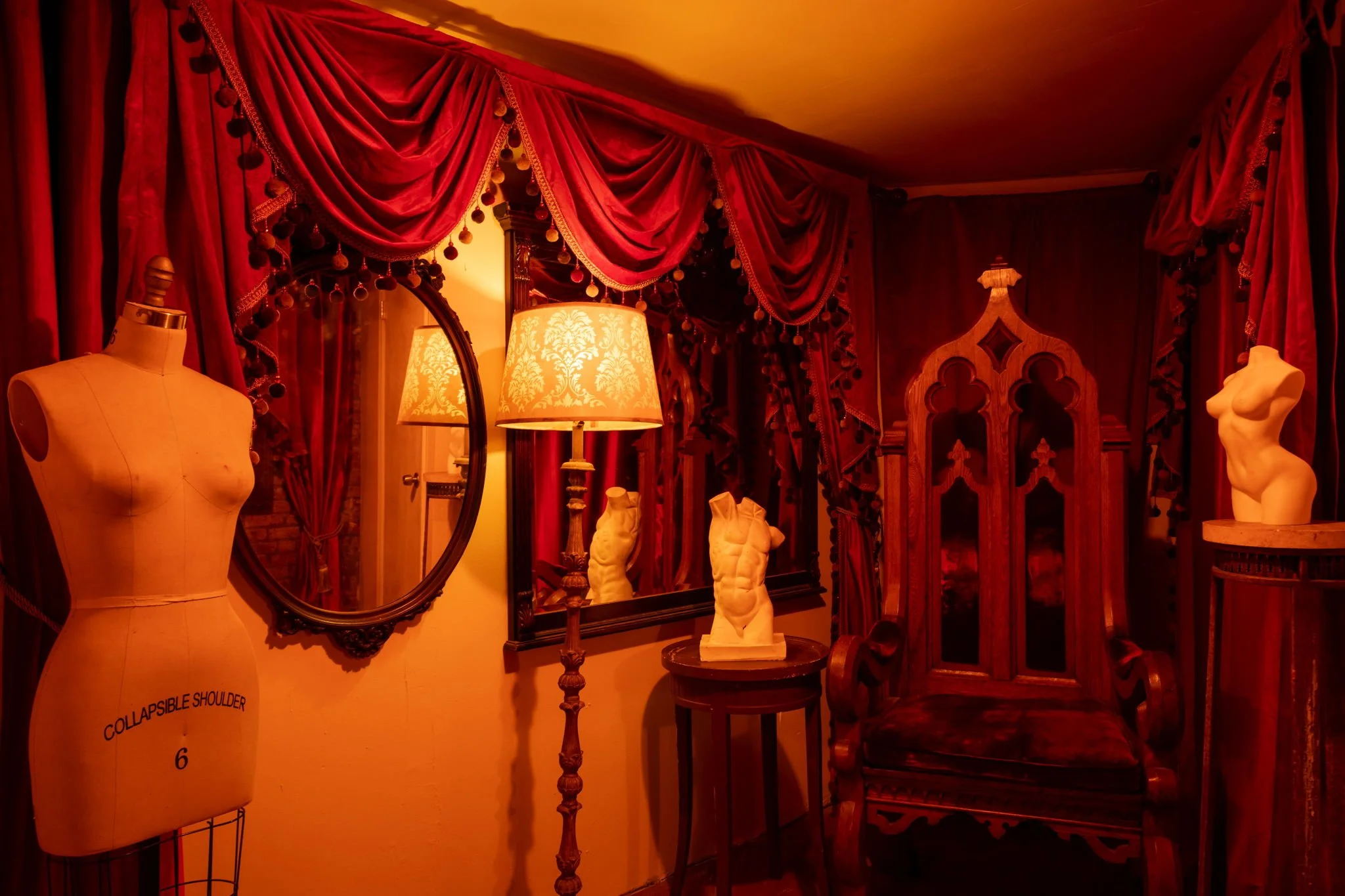 throne-red-curtains-statues-mirrors.jpg