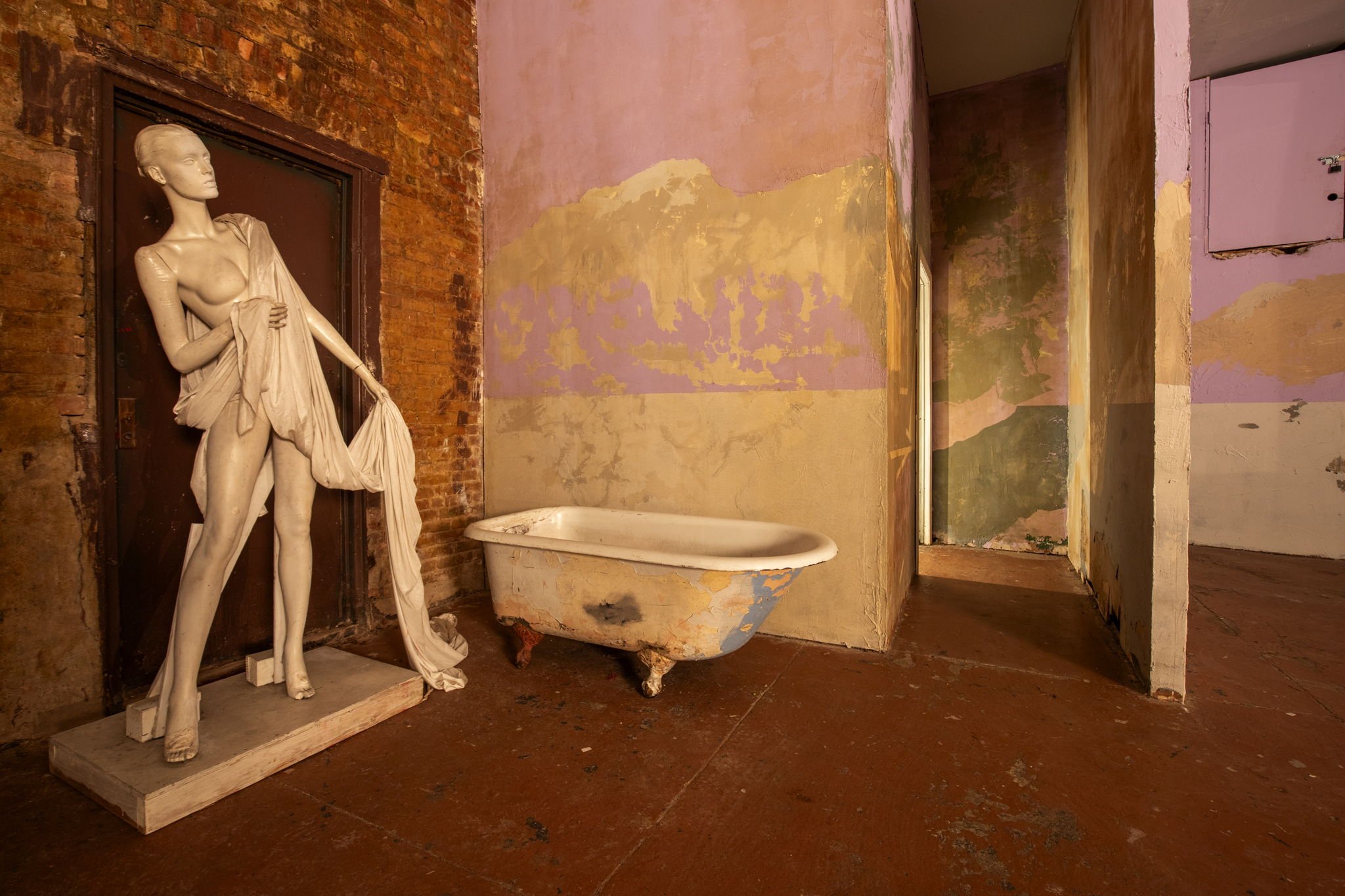 mannequin-tub-distressed-wall.jpg