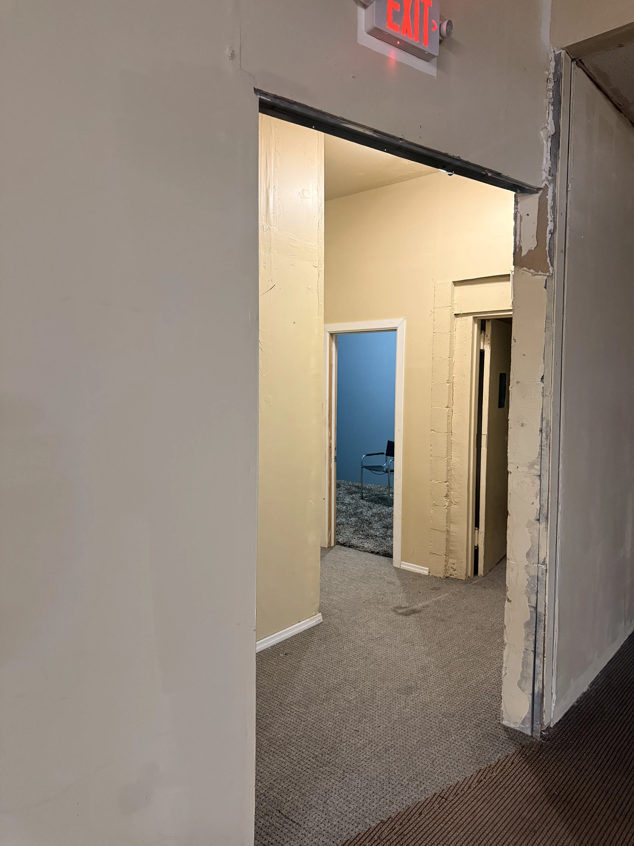 vacant-warehouse-hallway-door-1.jpeg