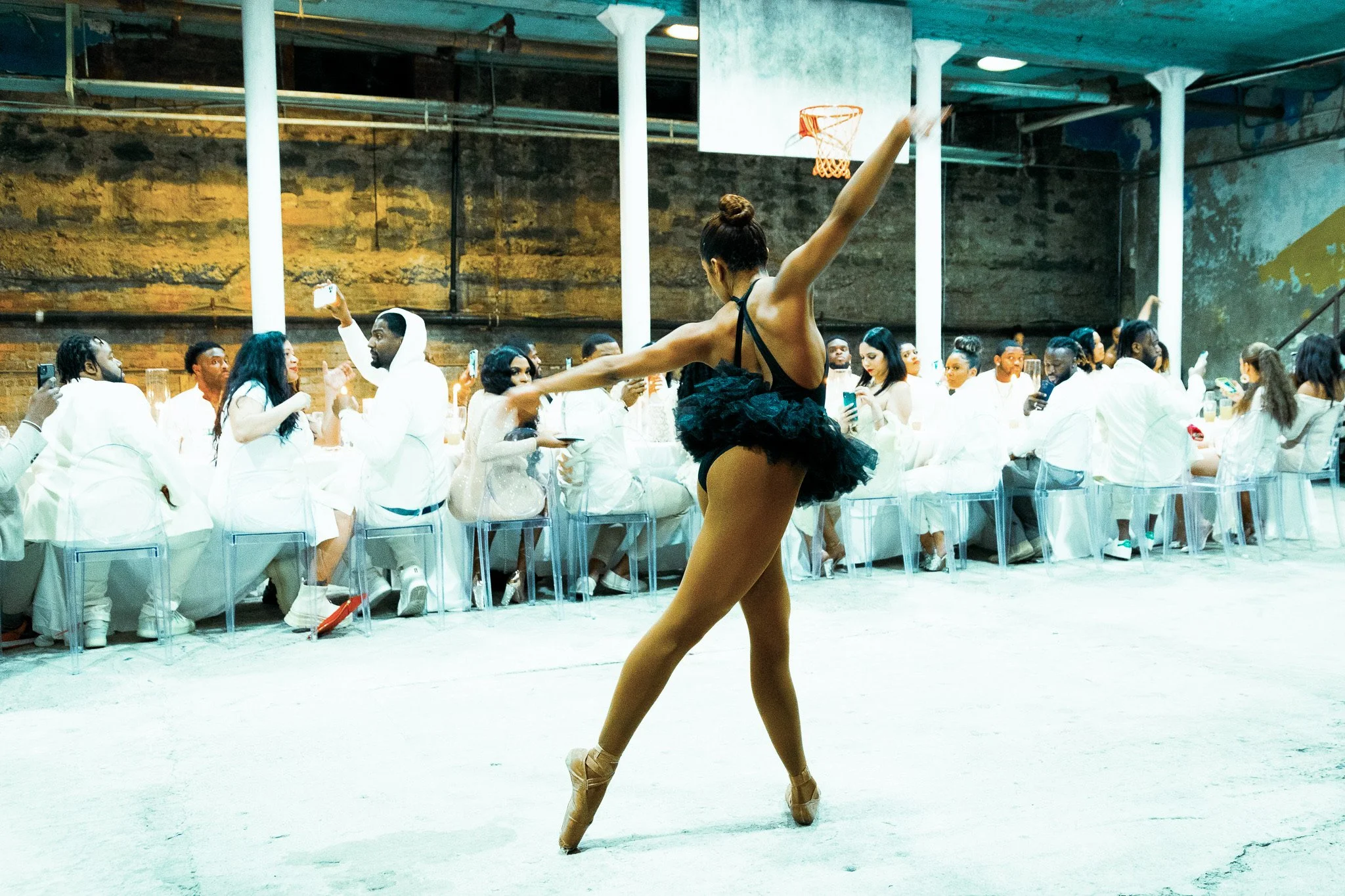Ballet dancer performing in the Gymnopedie gymnasium at a Kanye West Runaway themed dinner gala
