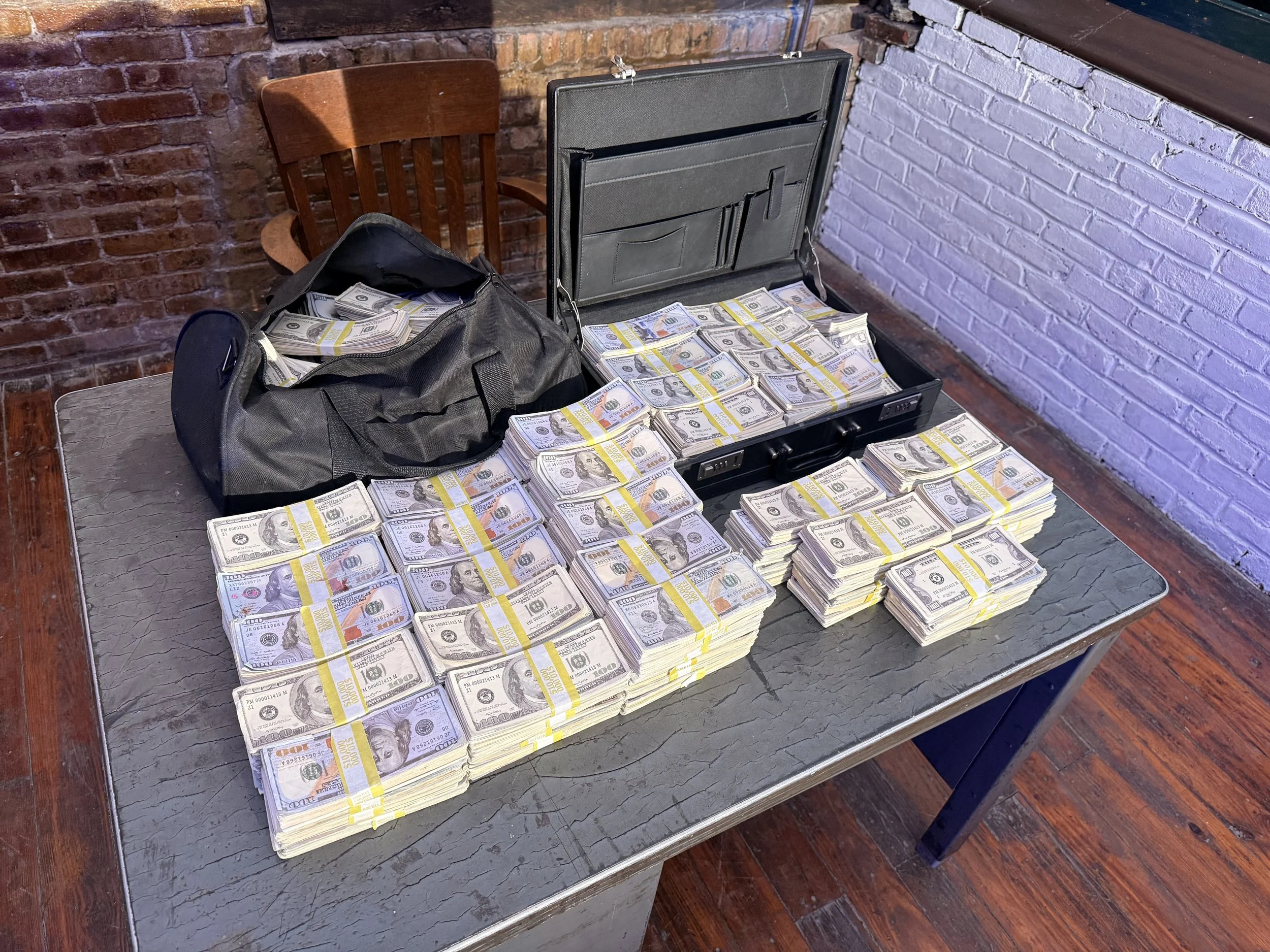 Prop money - stacks, briefcase, and duffle bag