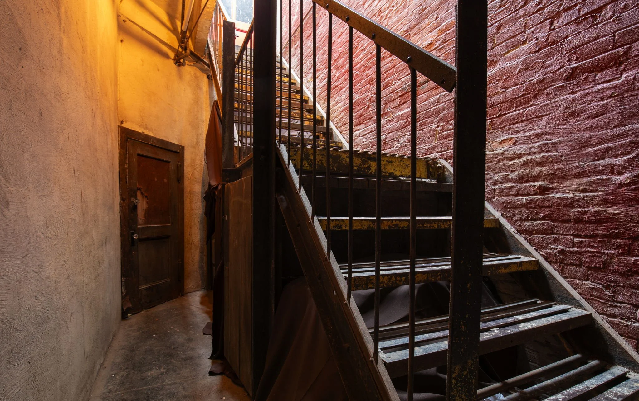 moody-stairwell-brick-industrial.jpg