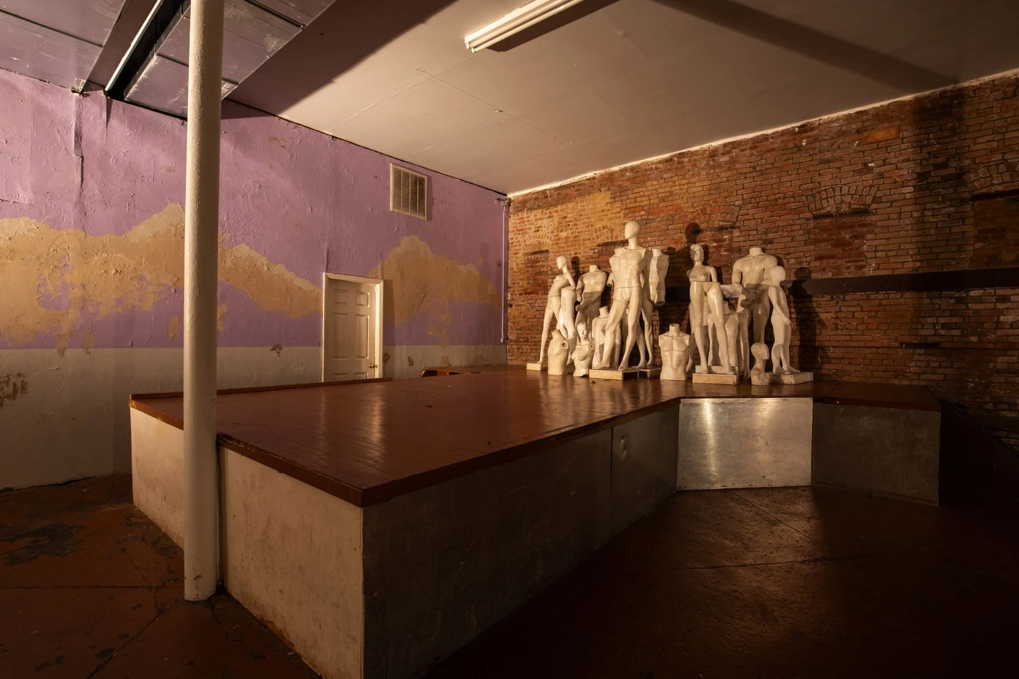 stage-mannequins-distressed-walls.jpg