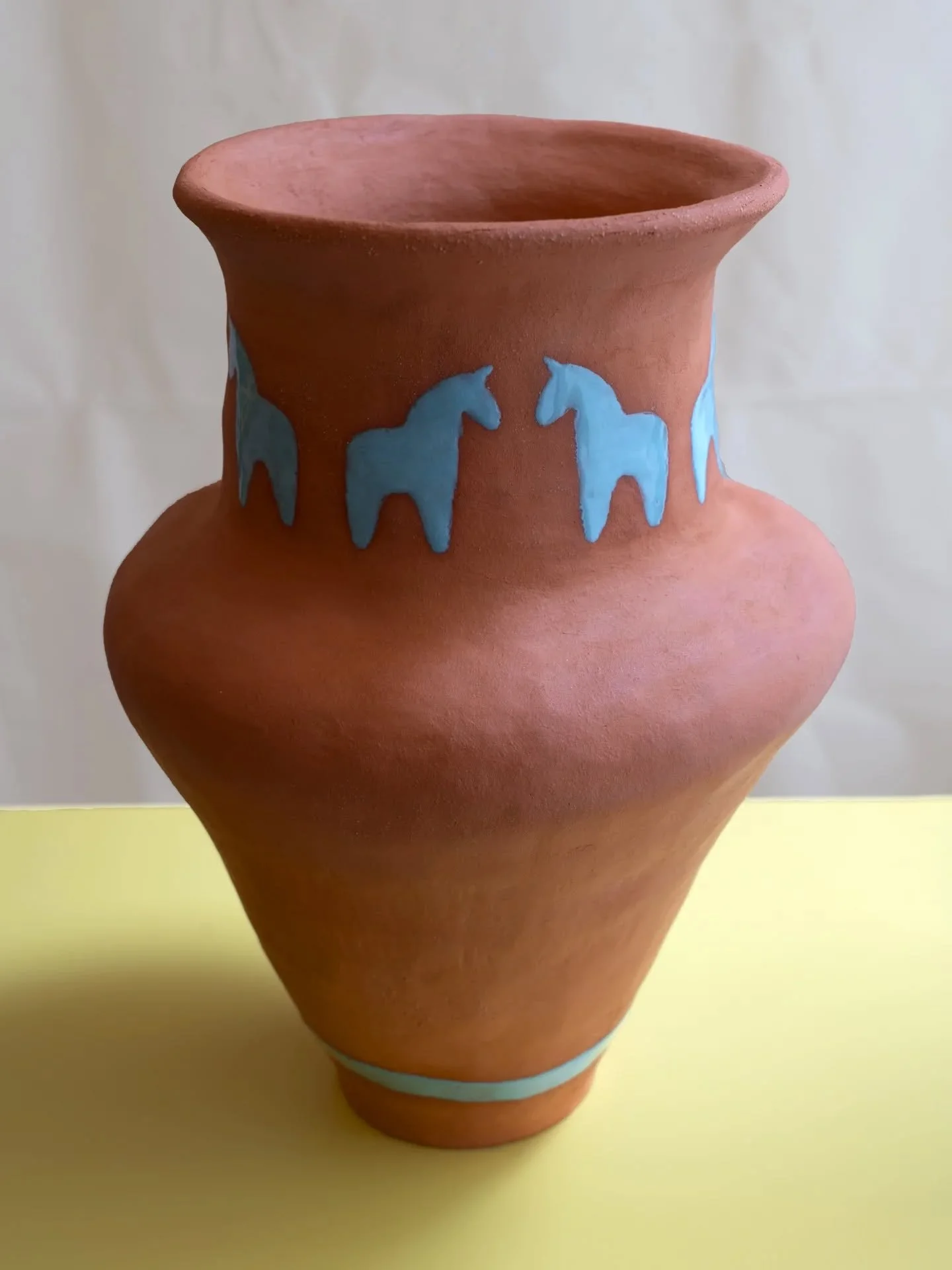 She is finished!

There&rsquo;s a quiet magic in the final unveiling. After the building, and the anxious wait in the kiln, this vase is complete.

I handbuilt this piece. The glazes are an intentional contrast to the natural textured and warm colors