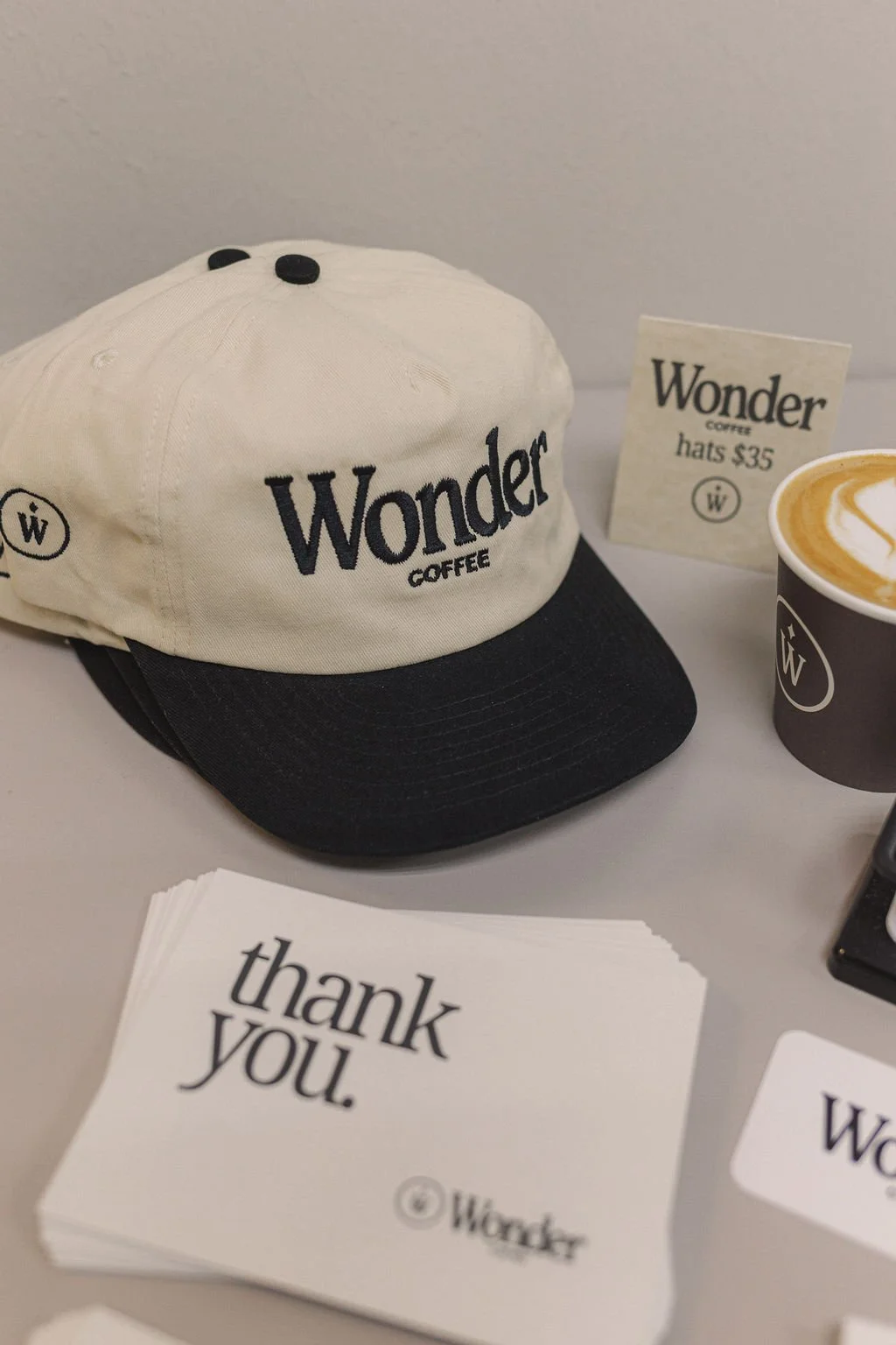 Wonder Coffee Cart in The Woodlands, Montgomery, Magnolia, and Conroe; hat merchandise