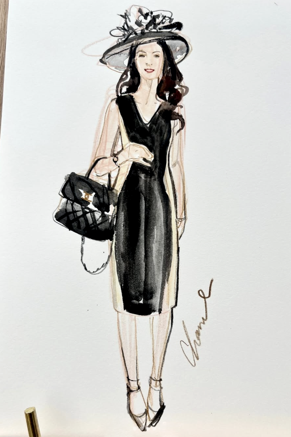 Fashion illustration of a woman wearing a black dress with sheer long sleeves, accessorized with a large hat with decorative feathers, carrying a black purse, and wearing high heels.