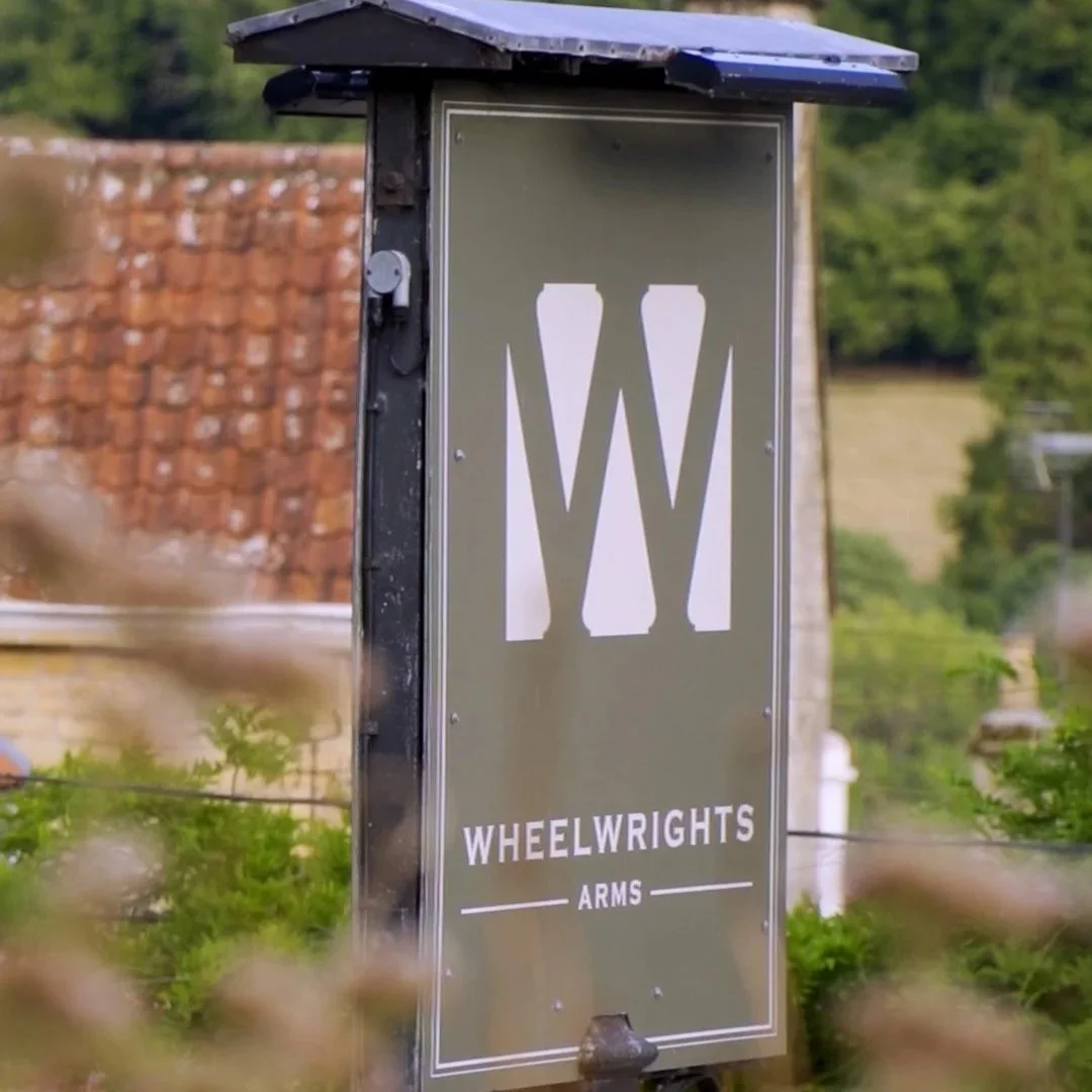 Outdoor Sign for a countryside pub named WheelWright Arms.