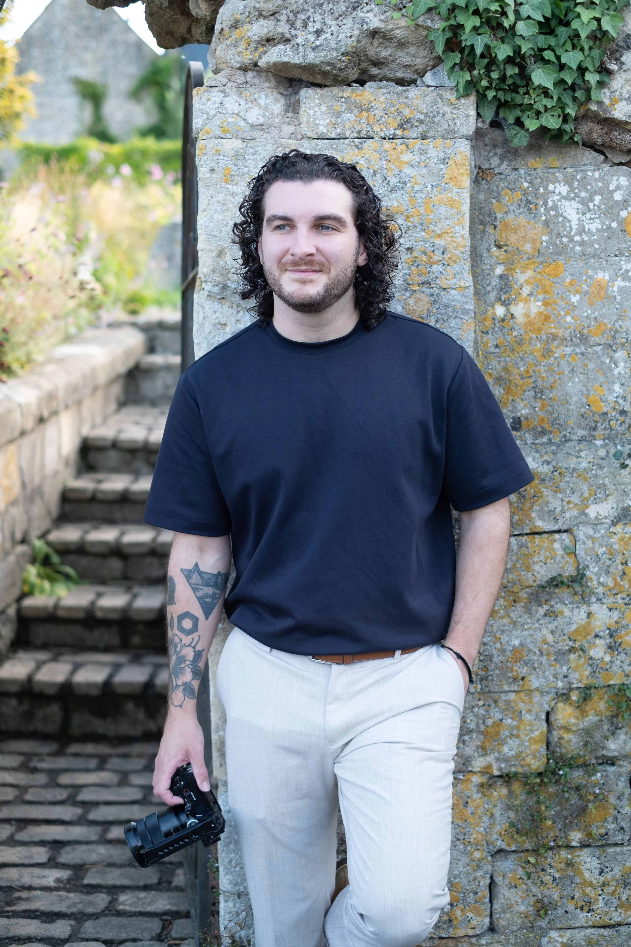 man standing against a wall