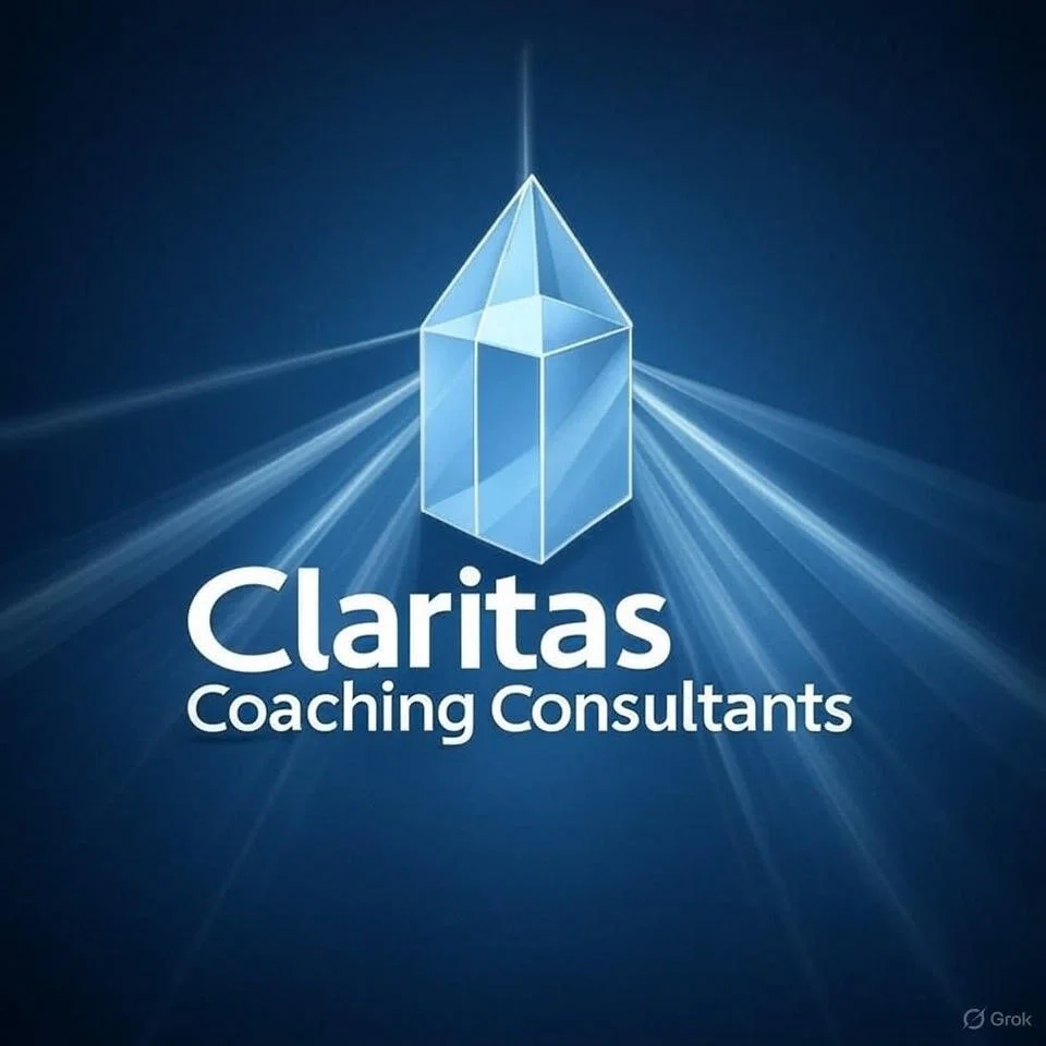 Logo for Claritas Coaching Consultants with a blue background and a geometric crystal or prism design emitting light rays.