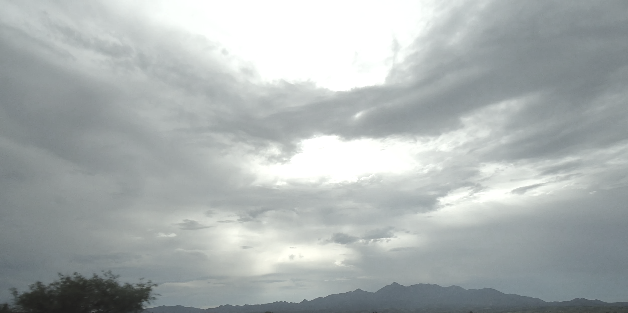 Ambient Cloud Image Creating a Reflective Mood for John Aylward’s music.