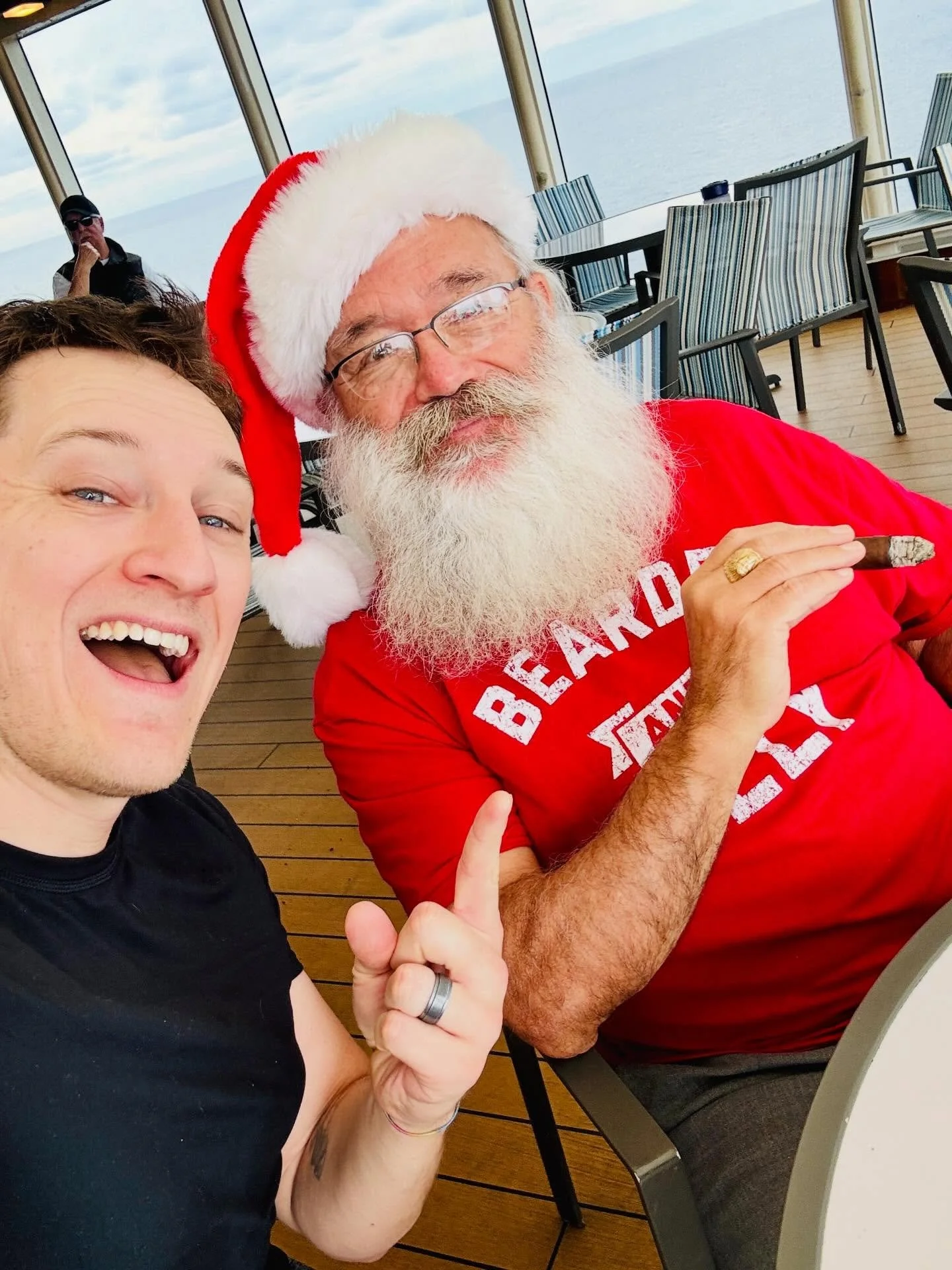Photobombed Santa before my show. He said I was a good boy this year and gave me a candy cane. Mrs. Clause was not present.