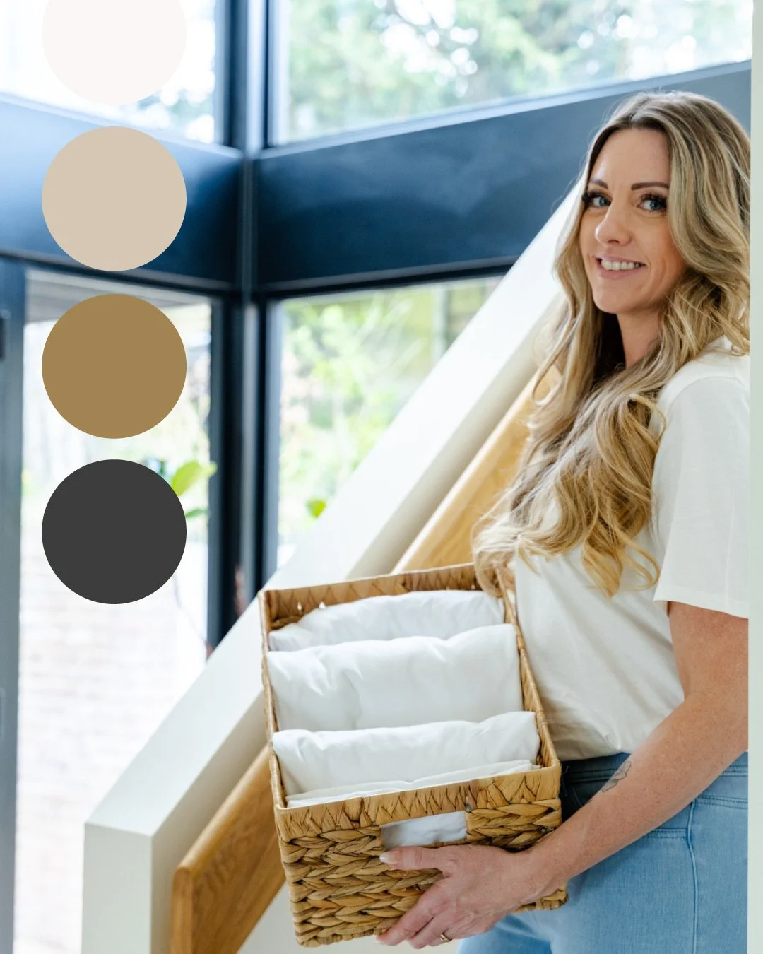 A woman with long blonde hair holding a woven basket with white cloth storage sleeves, standing indoors near large windows with a view of outdoor greenery. An example of their new branding in use.