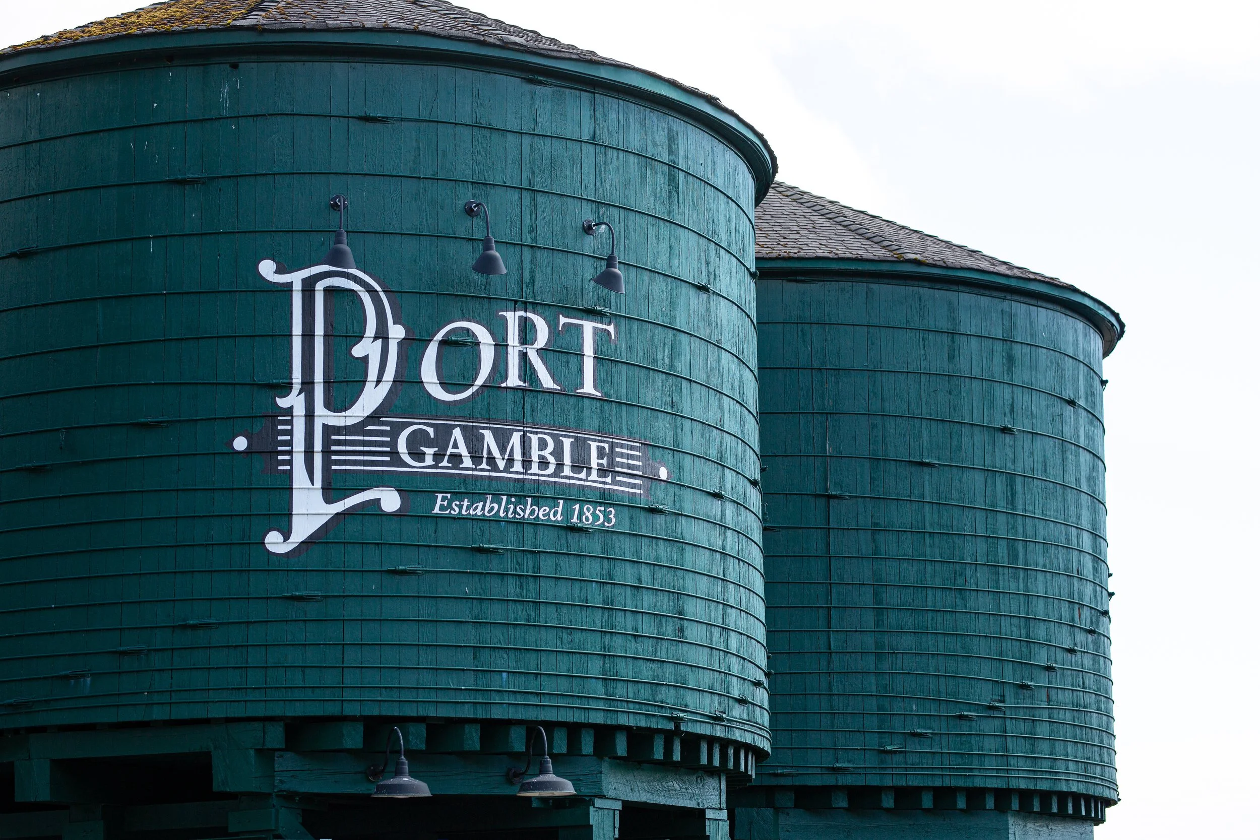 Historic Port Gamble water tower, marking the camp's location on the Kitsap Peninsula.