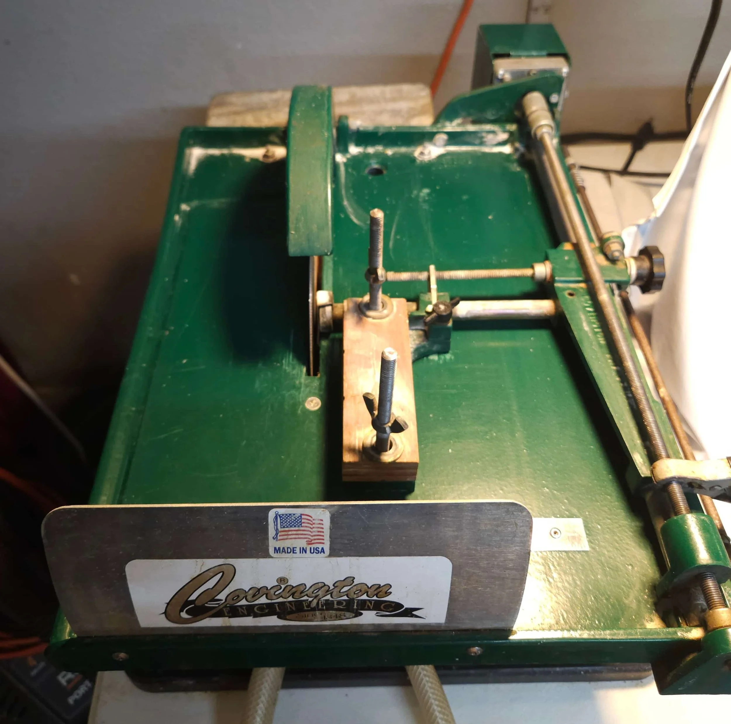 Commercial 10-inch lapidary slab saw equipment used for precision gemstone slabbing and cutting