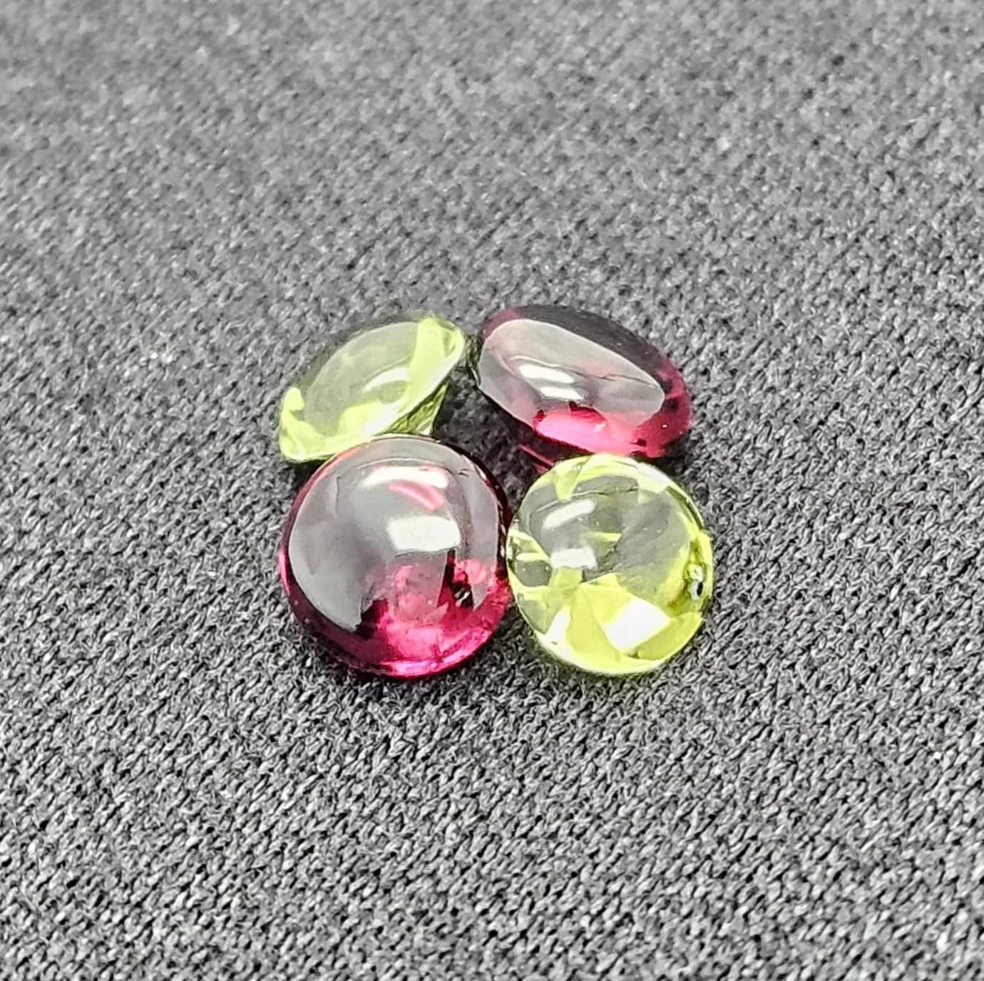 Arizona Peridot and Rhodolite garnet gemstone pairs arranged together nicely like Christmas ornaments.