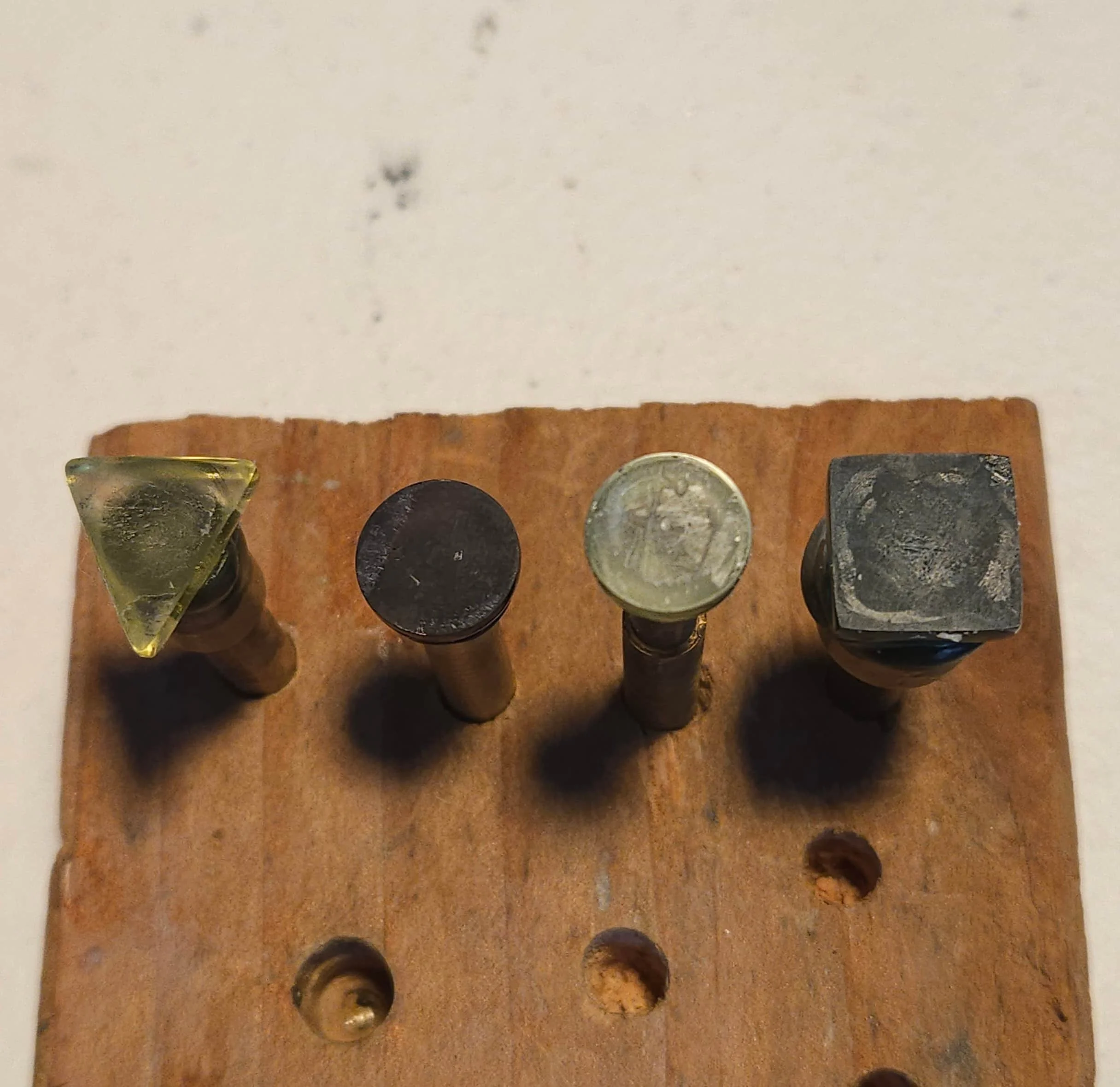 Close-up of the back side of the quartz cabochons before cutting and polishing.