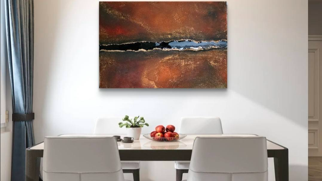 A minimalist dining room with a black table, four white chairs, and a white wall. An abstract painting with red, black, and brown tones hangs above the table. There is a bowl of apples, a potted plant, and a cup on the table. A window with dark curtains is on the left.