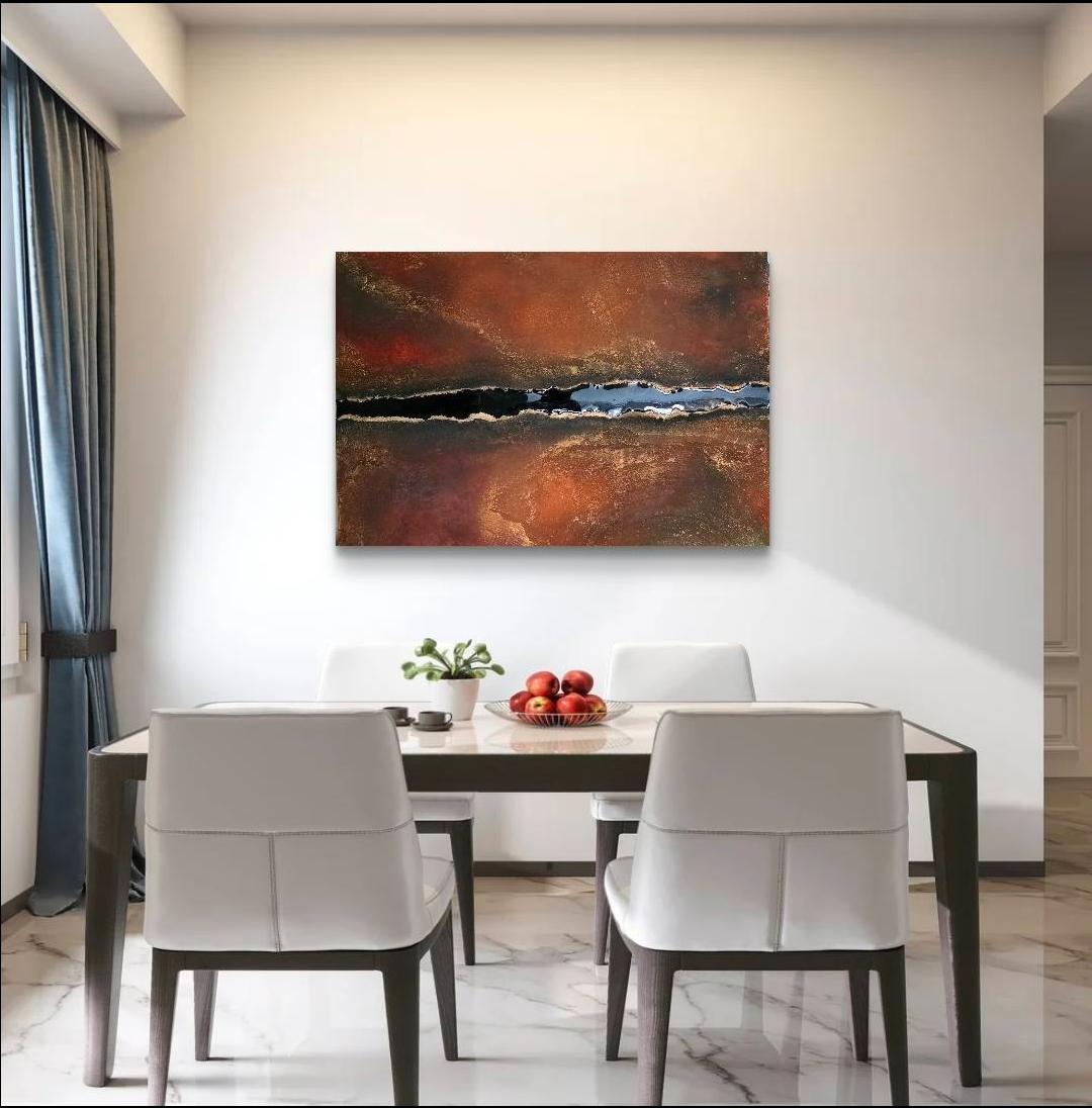 Modern dining room with a black wood table, four white chairs, a white potted plant, a bowl of red apples, and an abstract landscape painting with warm colors on the white wall.