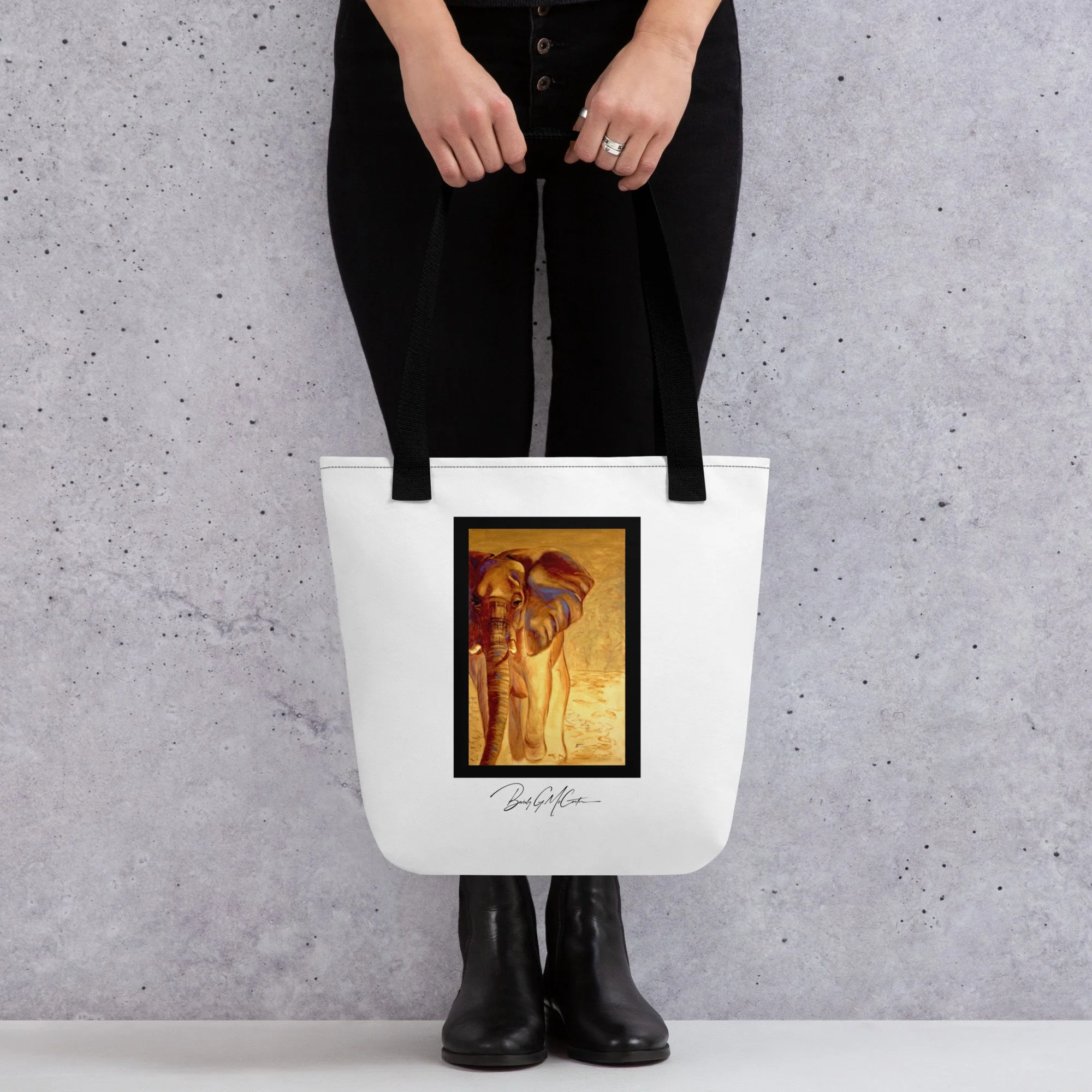 Polyester tote bag with Almost Gone oil print by Beverly G. McCarter, majestic elephant against savanna horizon symbolizing endangered habitats.