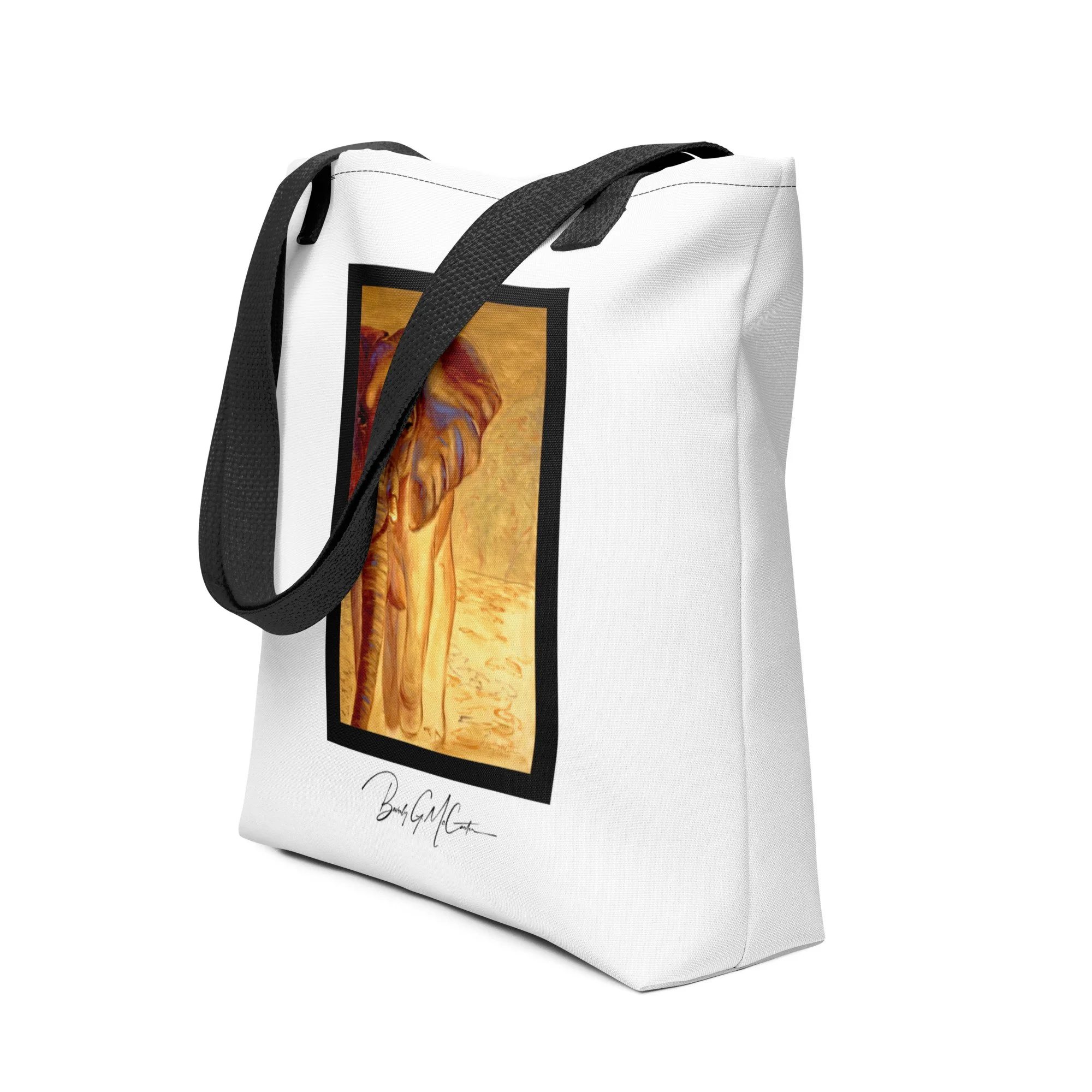 Polyester tote bag with Almost Gone oil print by Beverly G. McCarter, majestic elephant against savanna horizon symbolizing endangered habitats.