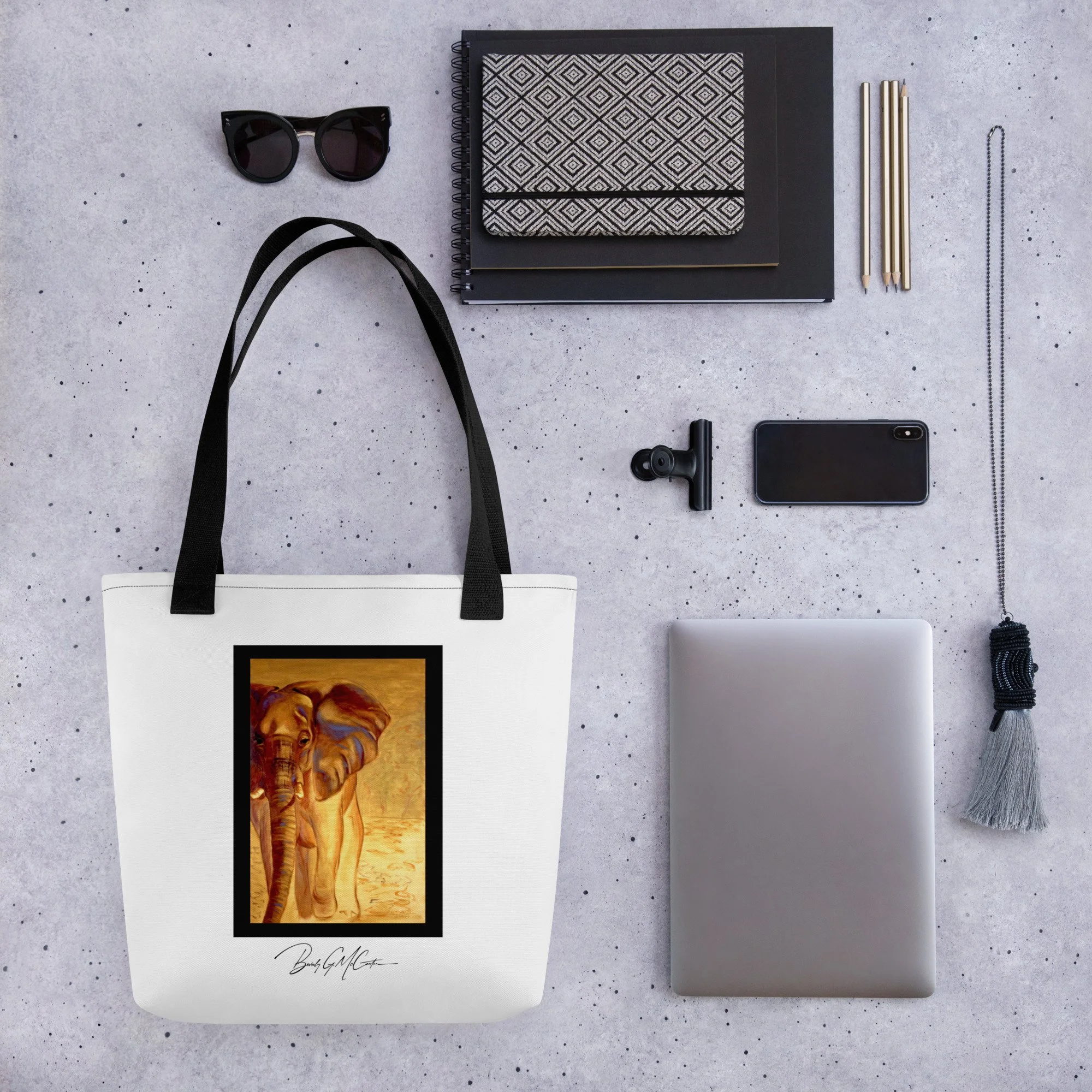 Polyester tote bag with Almost Gone oil print by Beverly G. McCarter, majestic elephant against savanna horizon symbolizing endangered habitats.