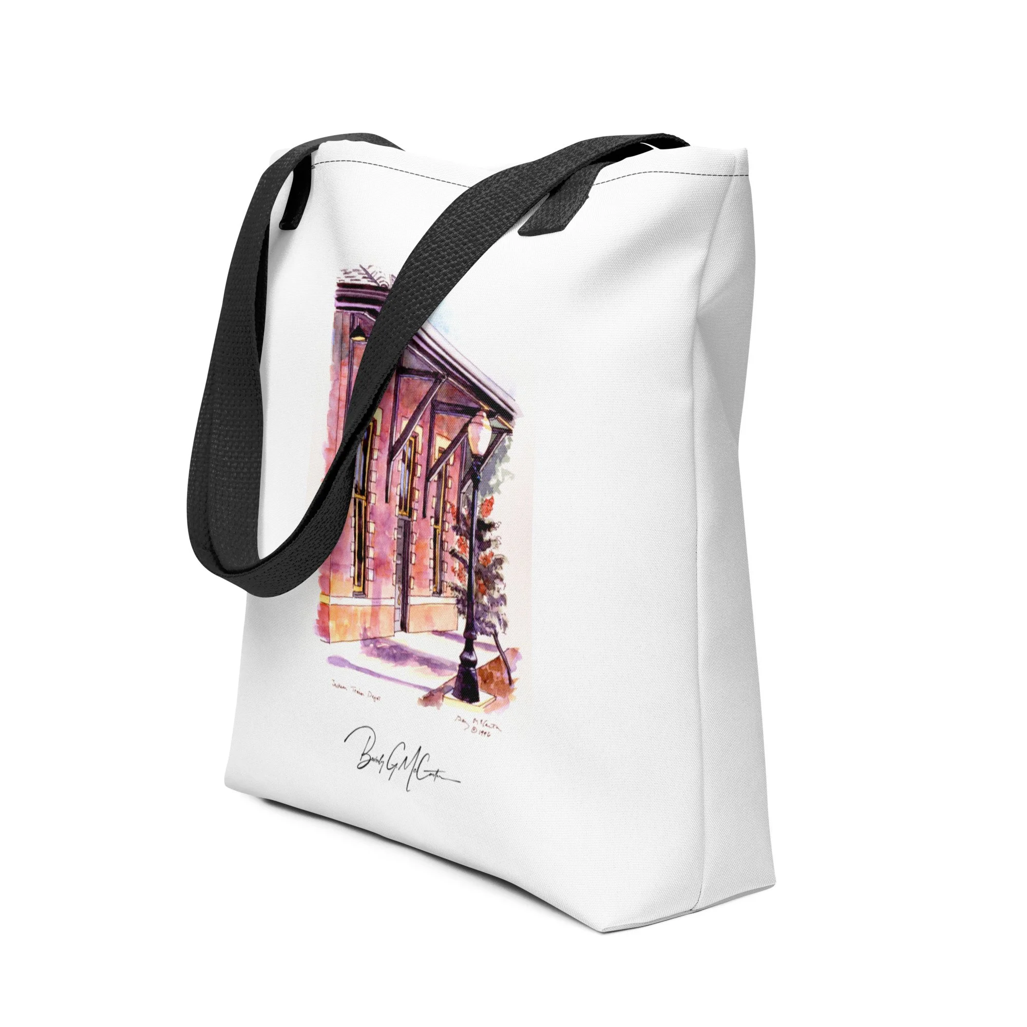 Polyester tote bag with Jackson Train Depot watercolor print by Beverly G. McCarter, 1907 landmark with rails and awning in luminous washes.