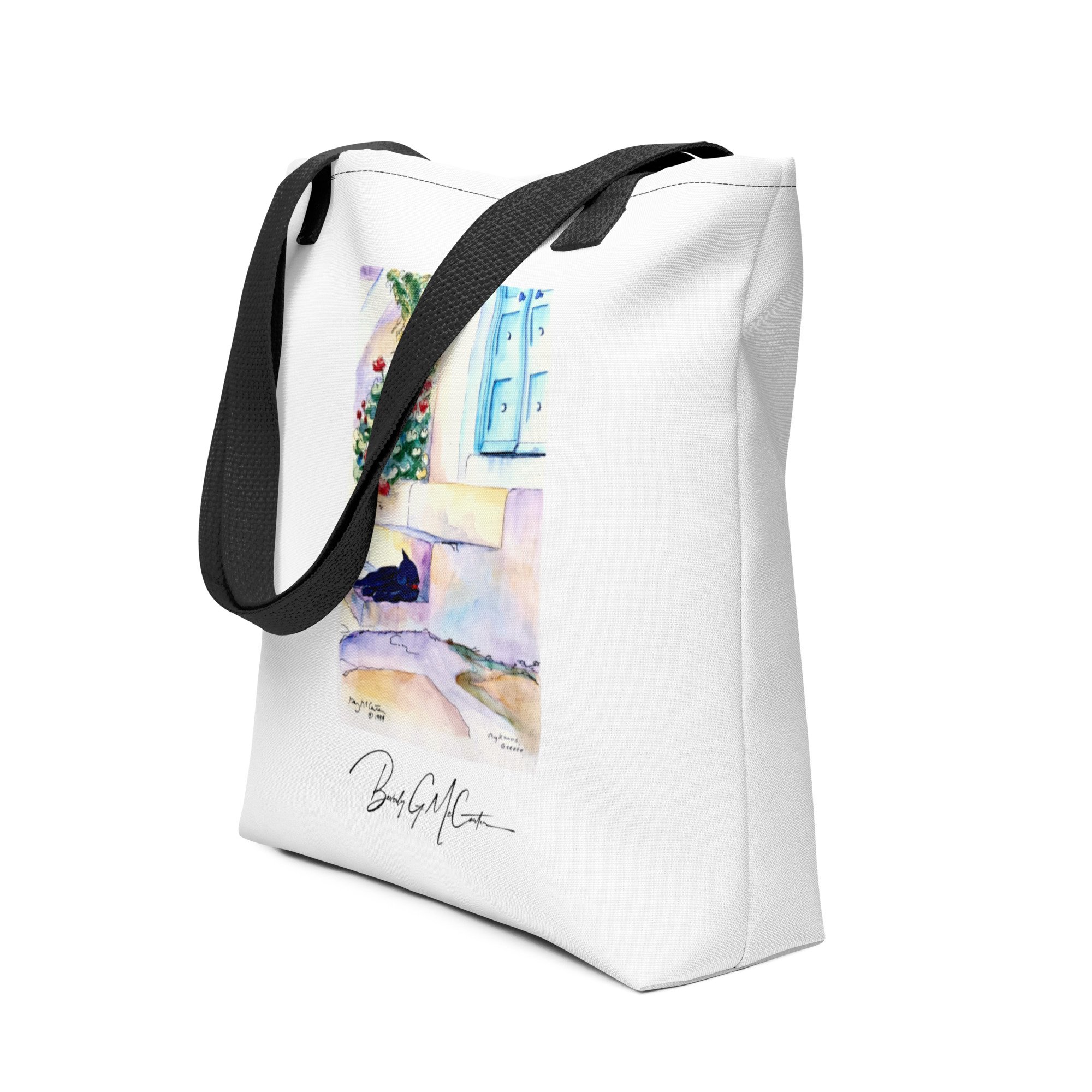 Polyester tote bag with Greek Island Cat watercolor print by Beverly G. McCarter, Mediterranean cat lounging by blue doors and red flowers.
