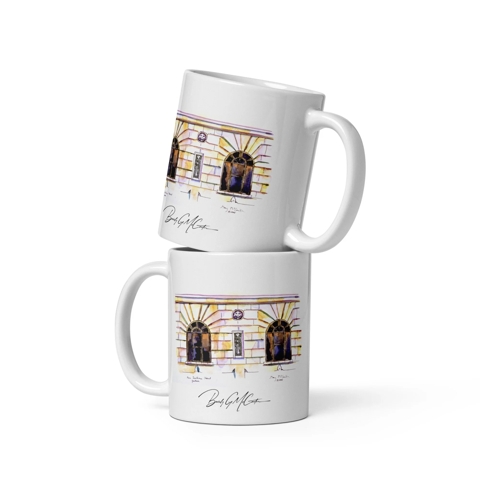 11 oz white ceramic mug with New Southern Hotel watercolor wrap by Beverly G. McCarter, Jackson TN landmark in translucent glow.