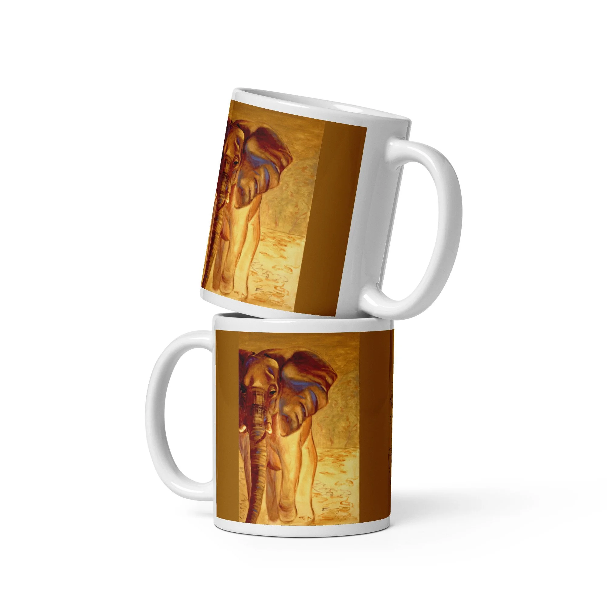 11 oz ceramic mug with Almost Gone oil wrap by Beverly G. McCarter, elephant in golden light on ochre background.