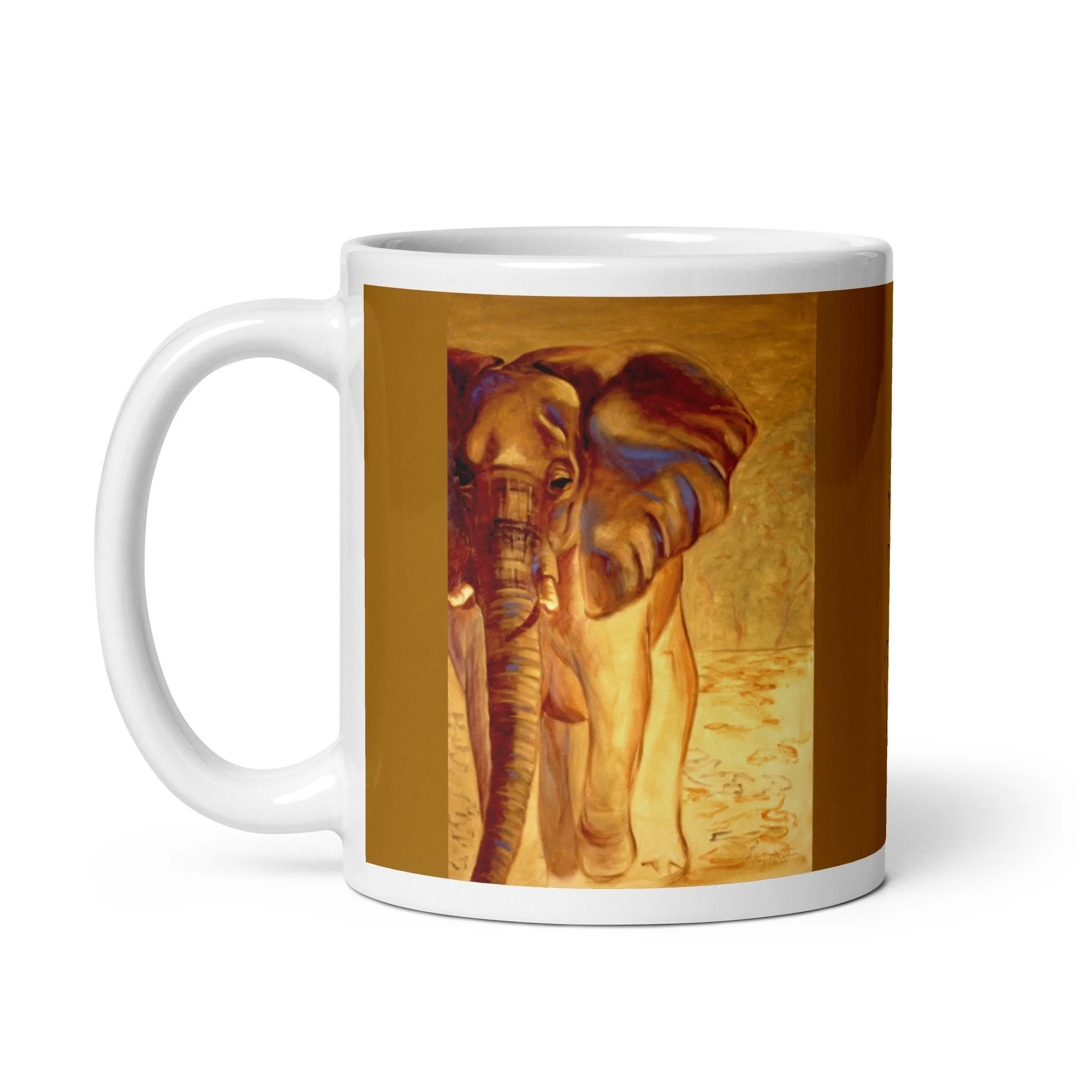 11 oz ceramic mug with Almost Gone oil wrap by Beverly G. McCarter, elephant in golden light on ochre background.