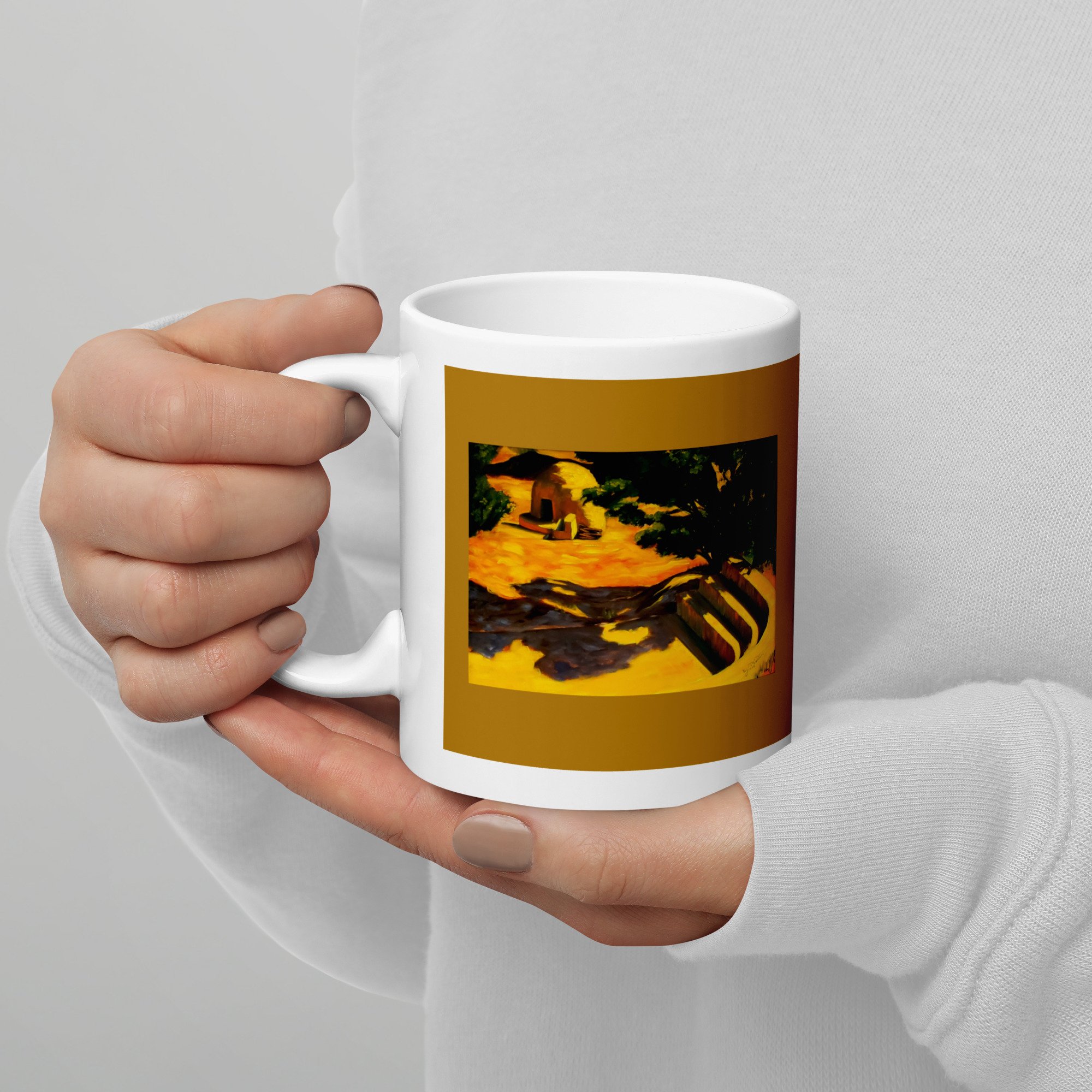 11 oz ceramic mug with Mergence of Time oil wrap by Beverly G. McCarter, ancient oven in desert on golden-ochre background.