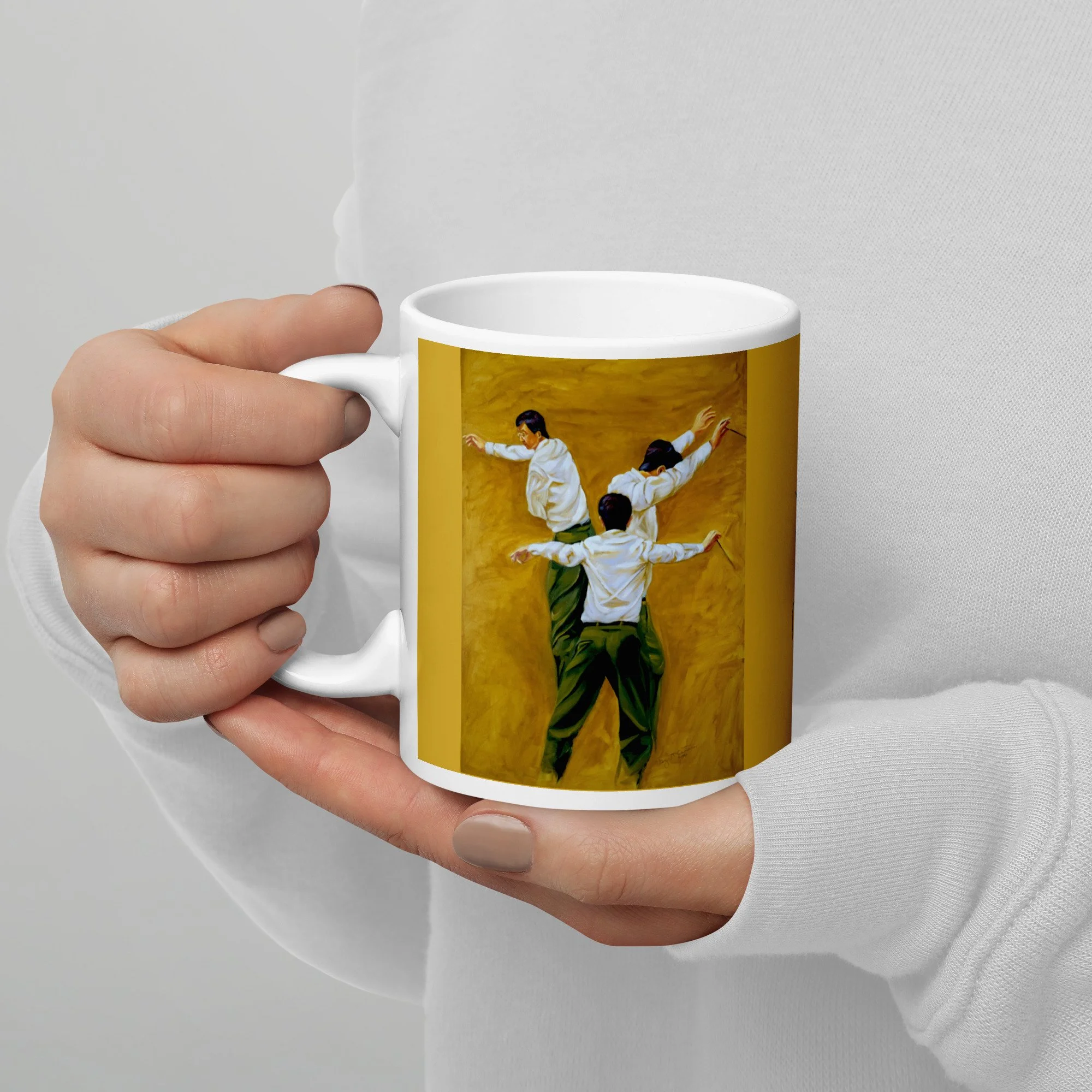 11 oz ceramic mug with Making it Work oil wrap by Beverly G. McCarter, layered conductor figures on golden background.