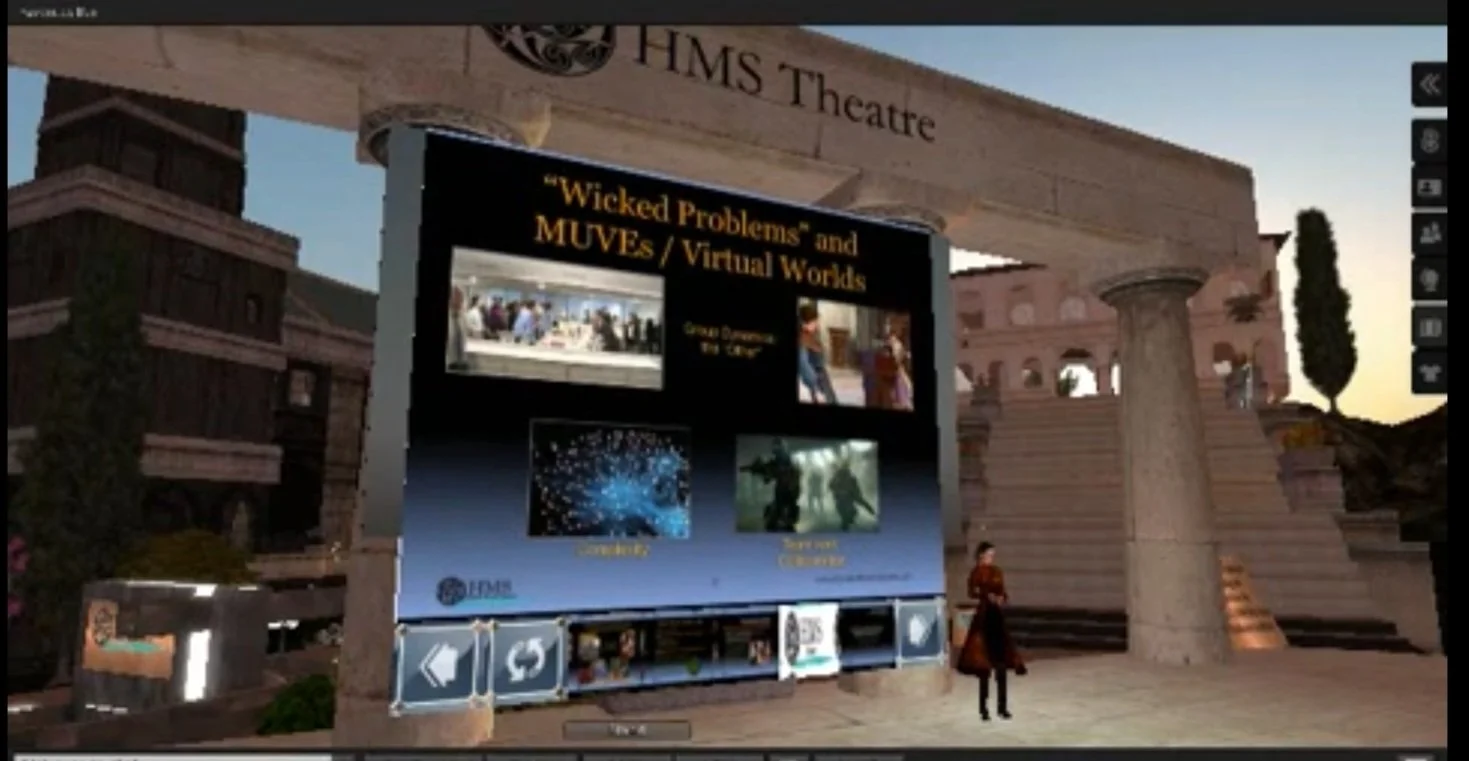 Beverly McCarter giving a presentation in Second Life on designing environments for human systems in 2009.