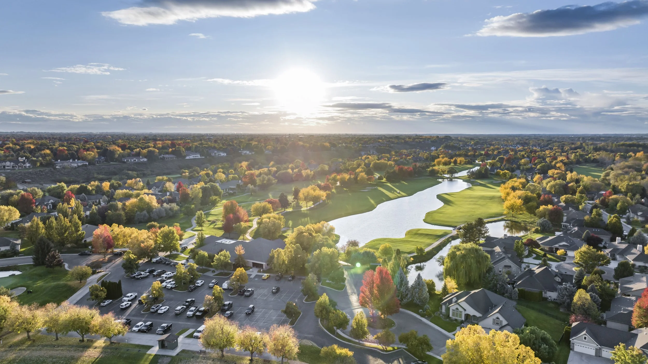An Eagle, Idaho golf course with neatly trimmed greens, surrounded by houses, the Boise River, surrounded by Eagle real estate.