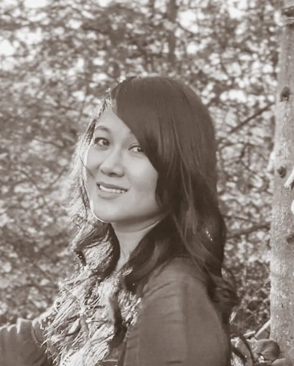 Sacred Nourish Holistic Wellbeing Guide and Home Cooking Artisan Sophie at Sacred Nourish London by trees in the sunset