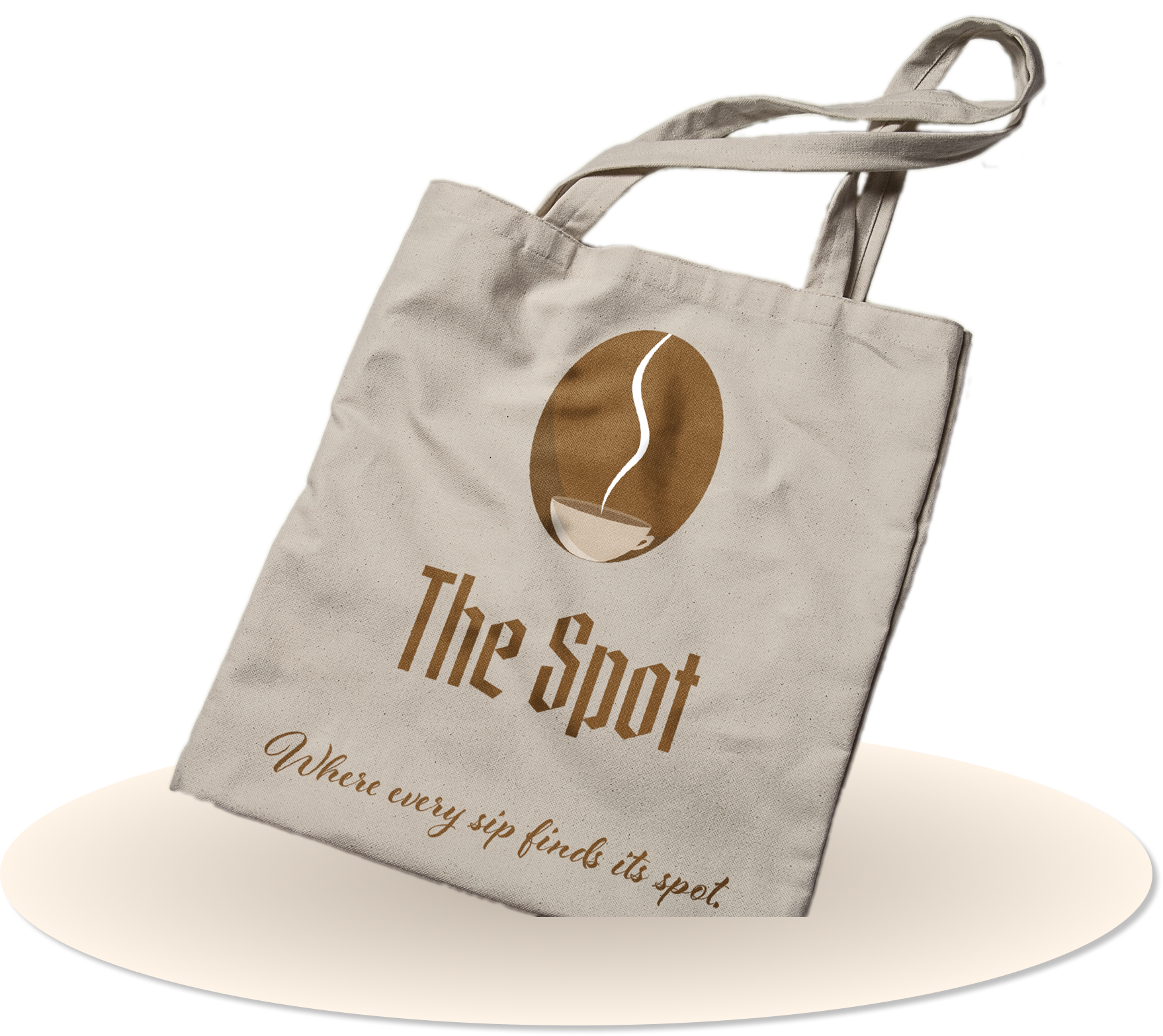 A beige tote bag with a coffee logo and the words "The Spot" and "Where every sip finds its spot" written on it.