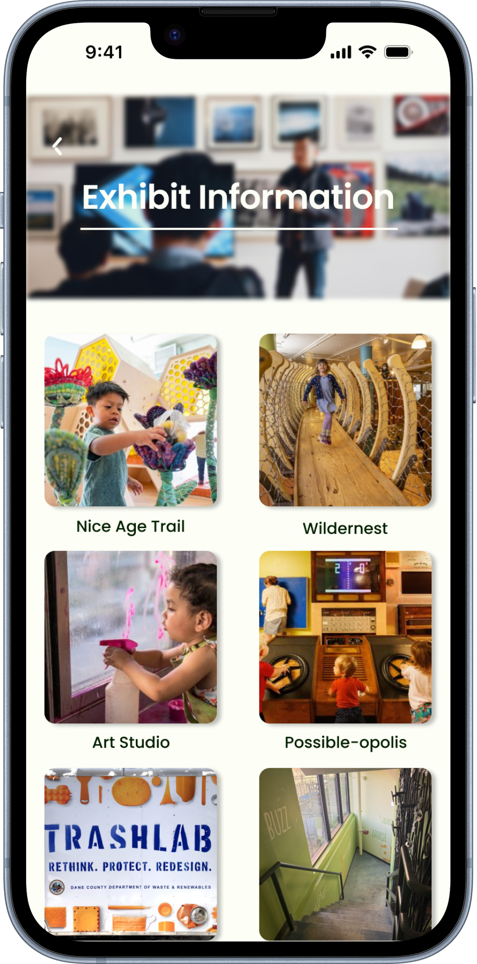 Mobile phone screen displaying exhibit information with images of children engaging in activities like art, play, and exploration at a museum or educational space.