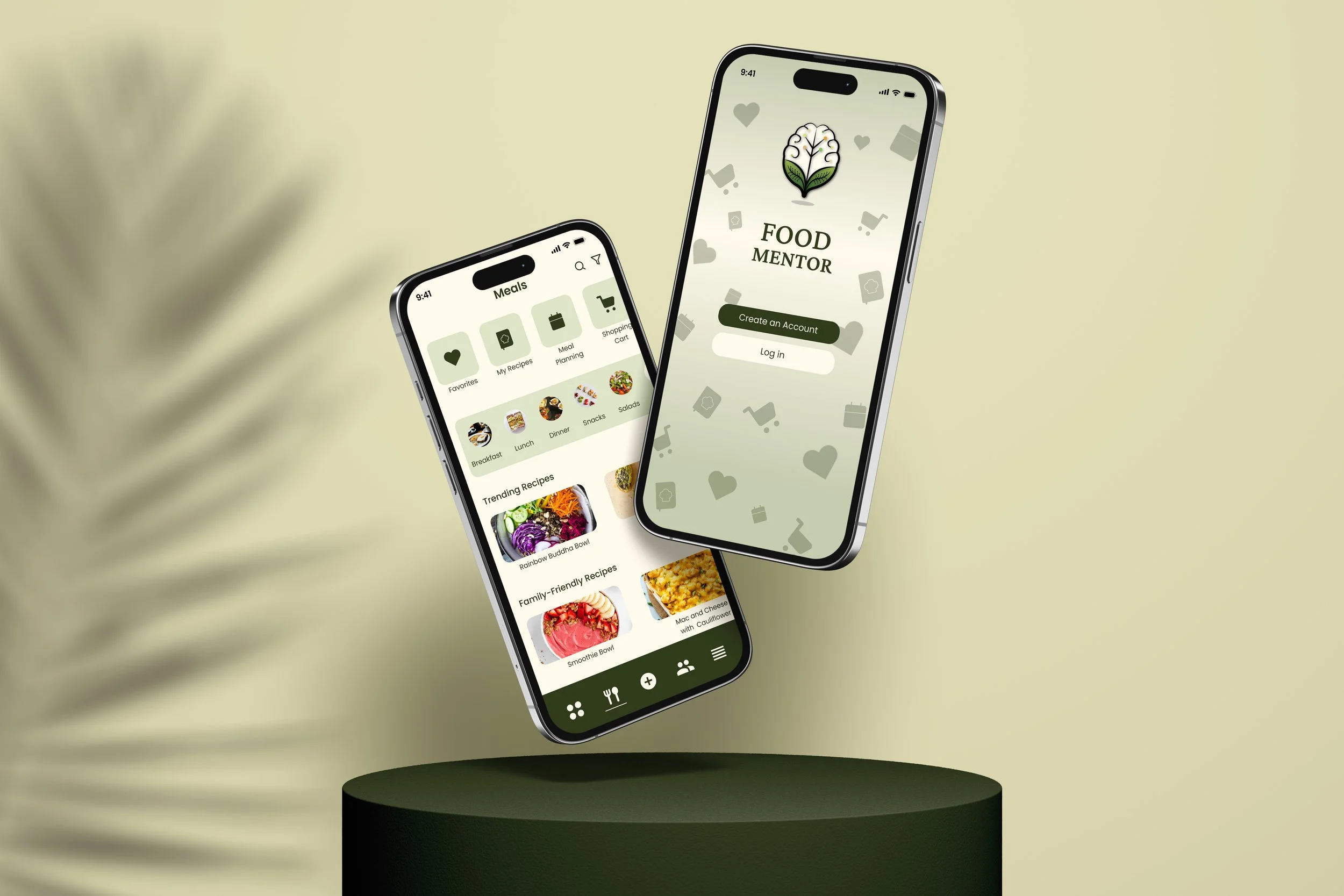 Two smartphones displaying a food-related app called Food Mentor on a black cylindrical stand against a pale yellow background with a blurred leaf shadow. One phone shows the main menu with options for recipes, meal planning, shopping cart, and trending recipes. The other shows the app's login screen with a logo of a brain with leaves.