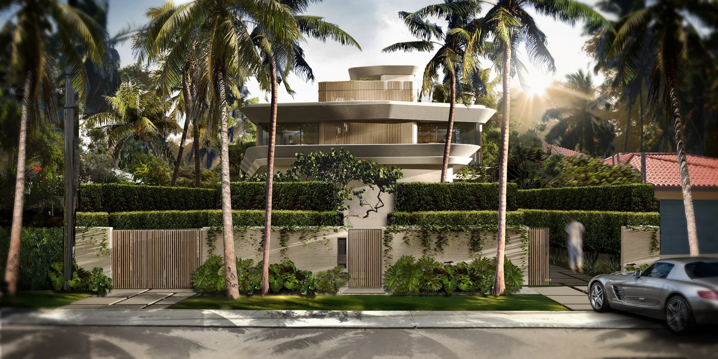 Modern multi-story house with curved architectural design, surrounded by palm trees and lush greenery, with a gate in front and a car parked on the street.