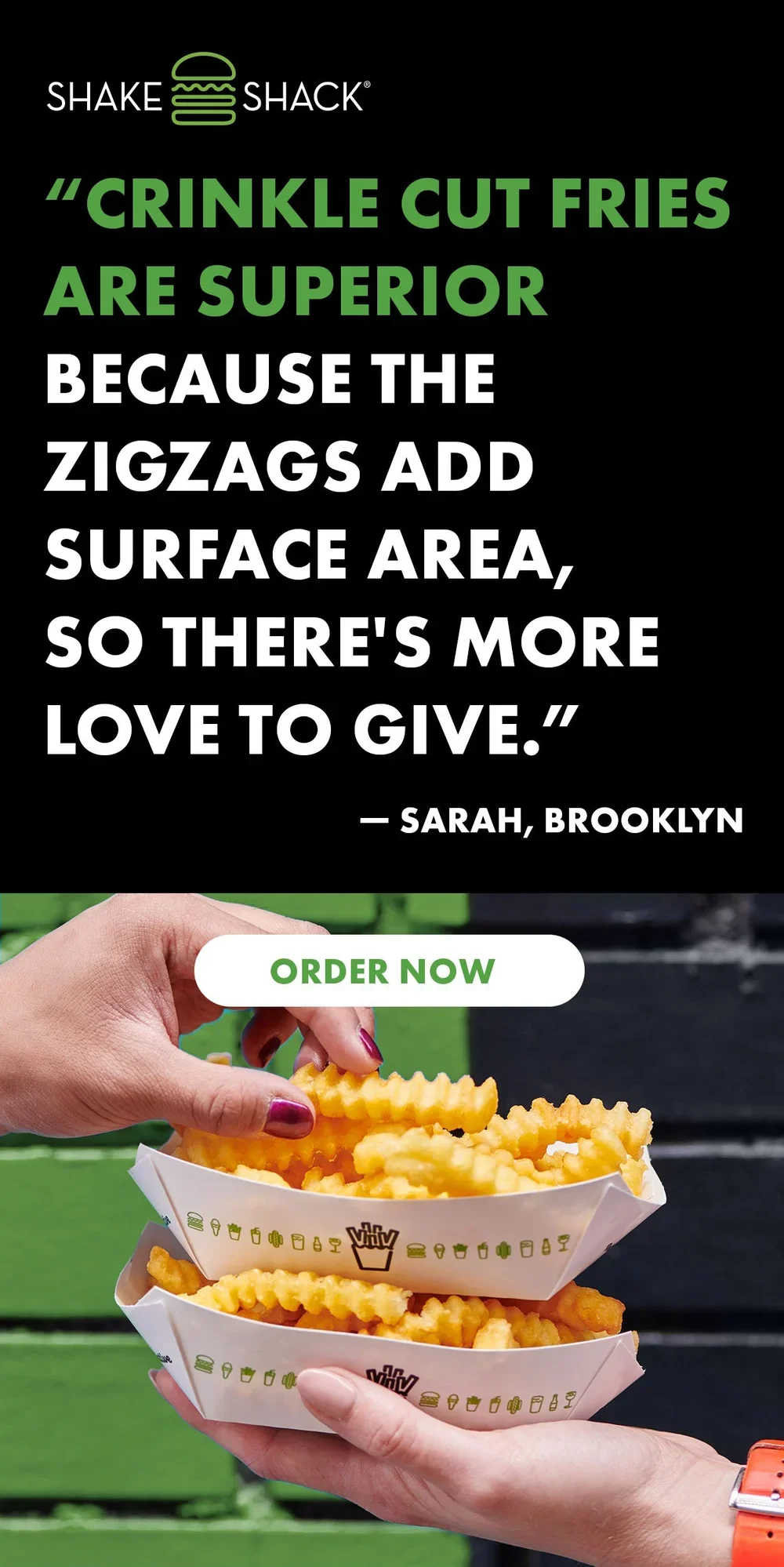 A promotional image for Shake Shack featuring a quote about crinkle cut fries and a photo of hands holding two trays of crinkle cut fries in branded paper containers.