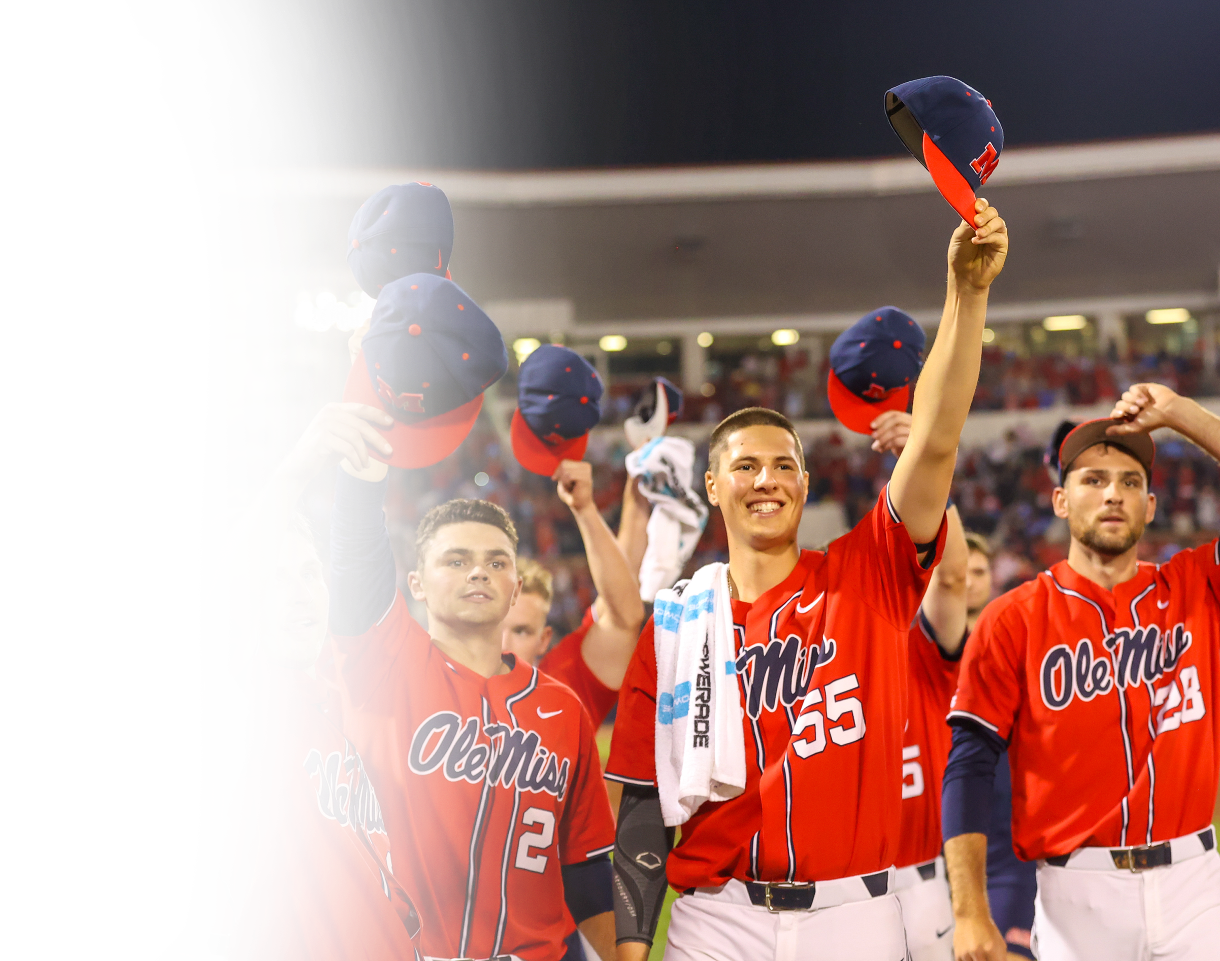 Wes Burton tips cap to crowd in Ole Miss uniform. Wes is a baseball mentorship expert