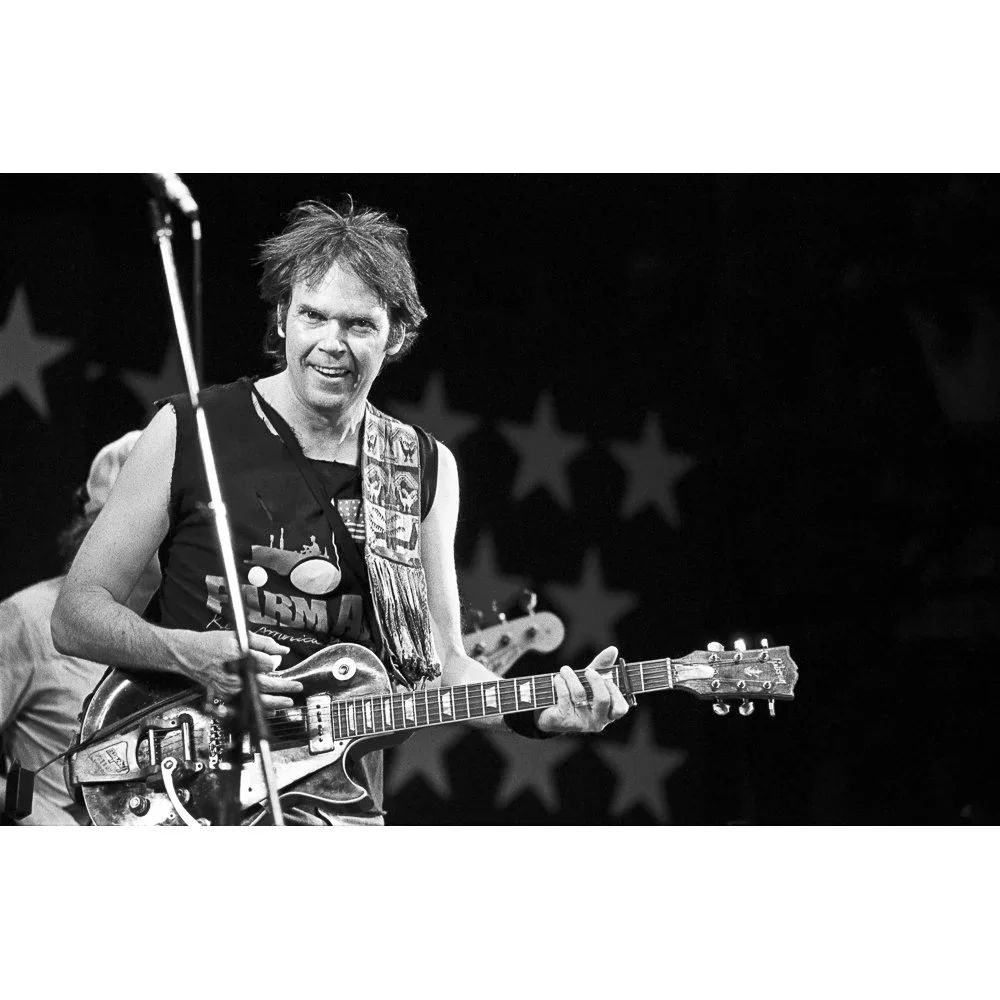 Neil+Young+at+Farm+Aid.+Manor%2C+Texas+1986.webp