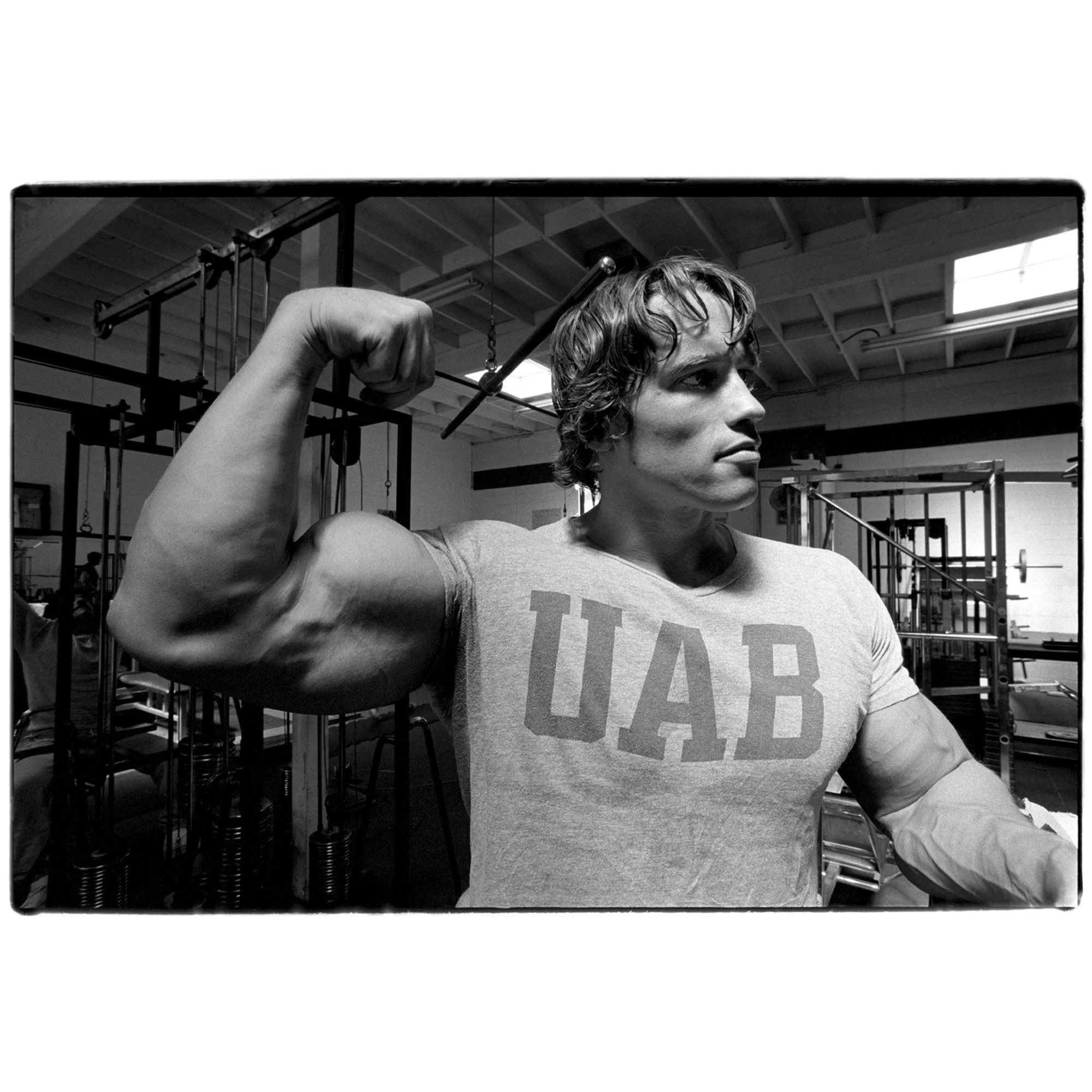 Arnold Schwarzenegger at the original Gold's Gym by Al Satterwhite