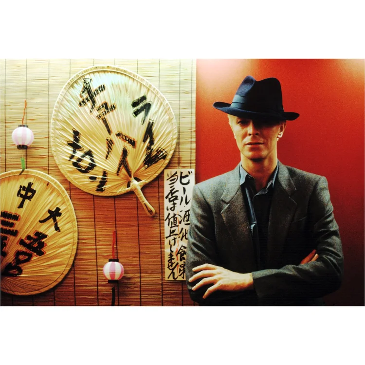 David Bowie in a restaurant, Tokyo, Japan 1983 by Denis O'Regan