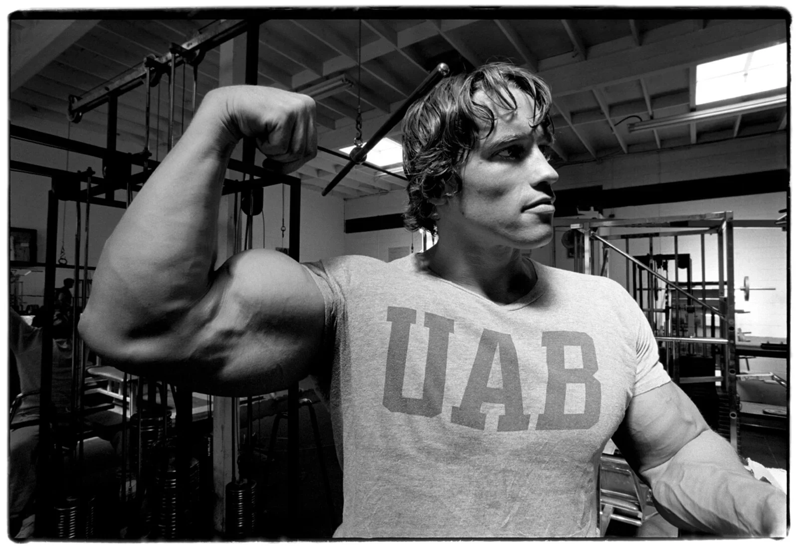Arnold Schwarzenegger at the original Gold's Gym by Al Satterwhite