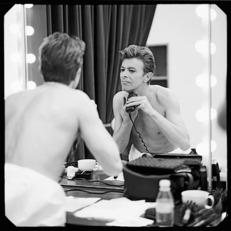 David Bowie shaving by photographer Bruce Malone